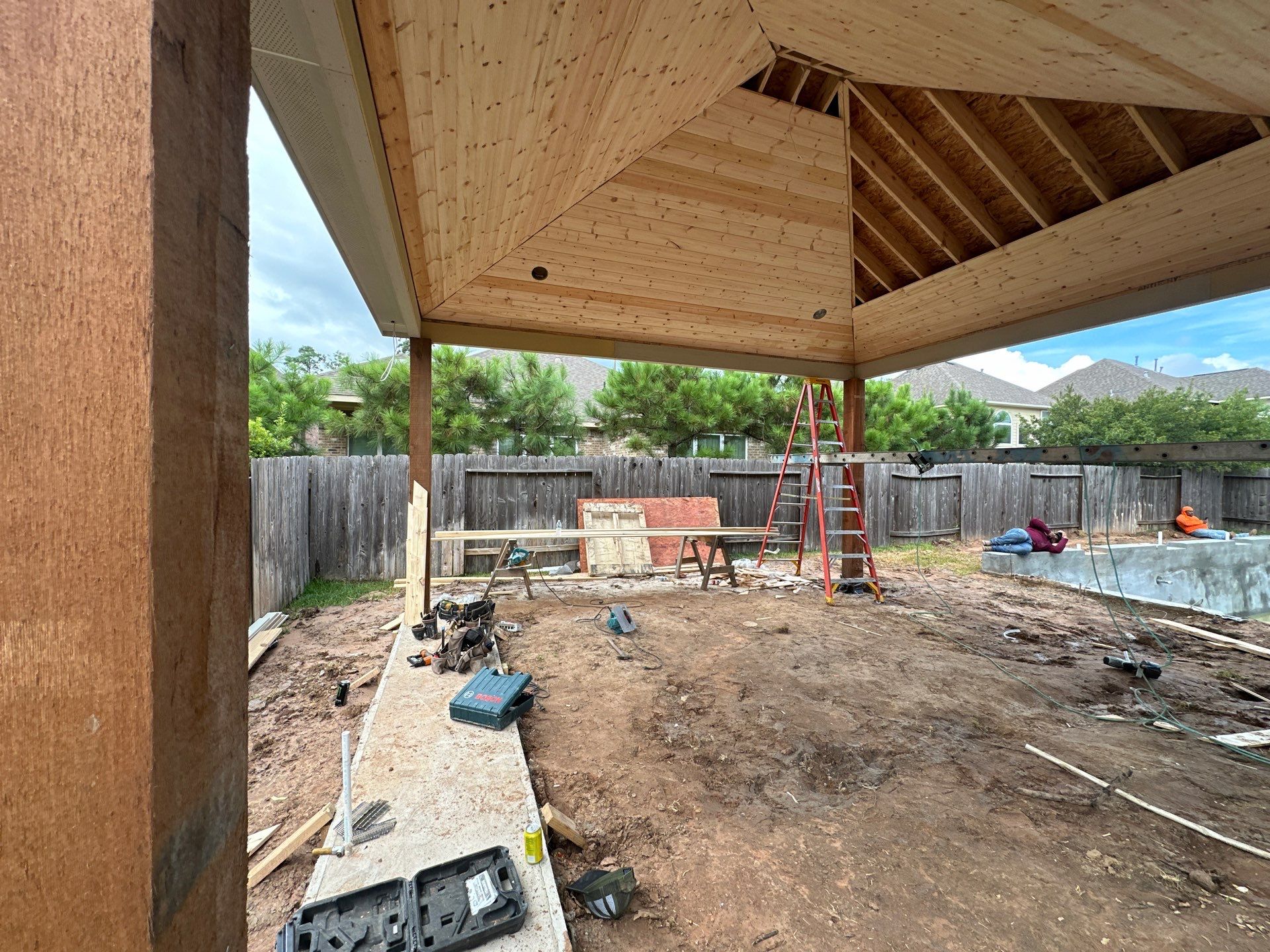 Covered Patio and Summer Kitchen in Spring,  TX by SophAlx LLC