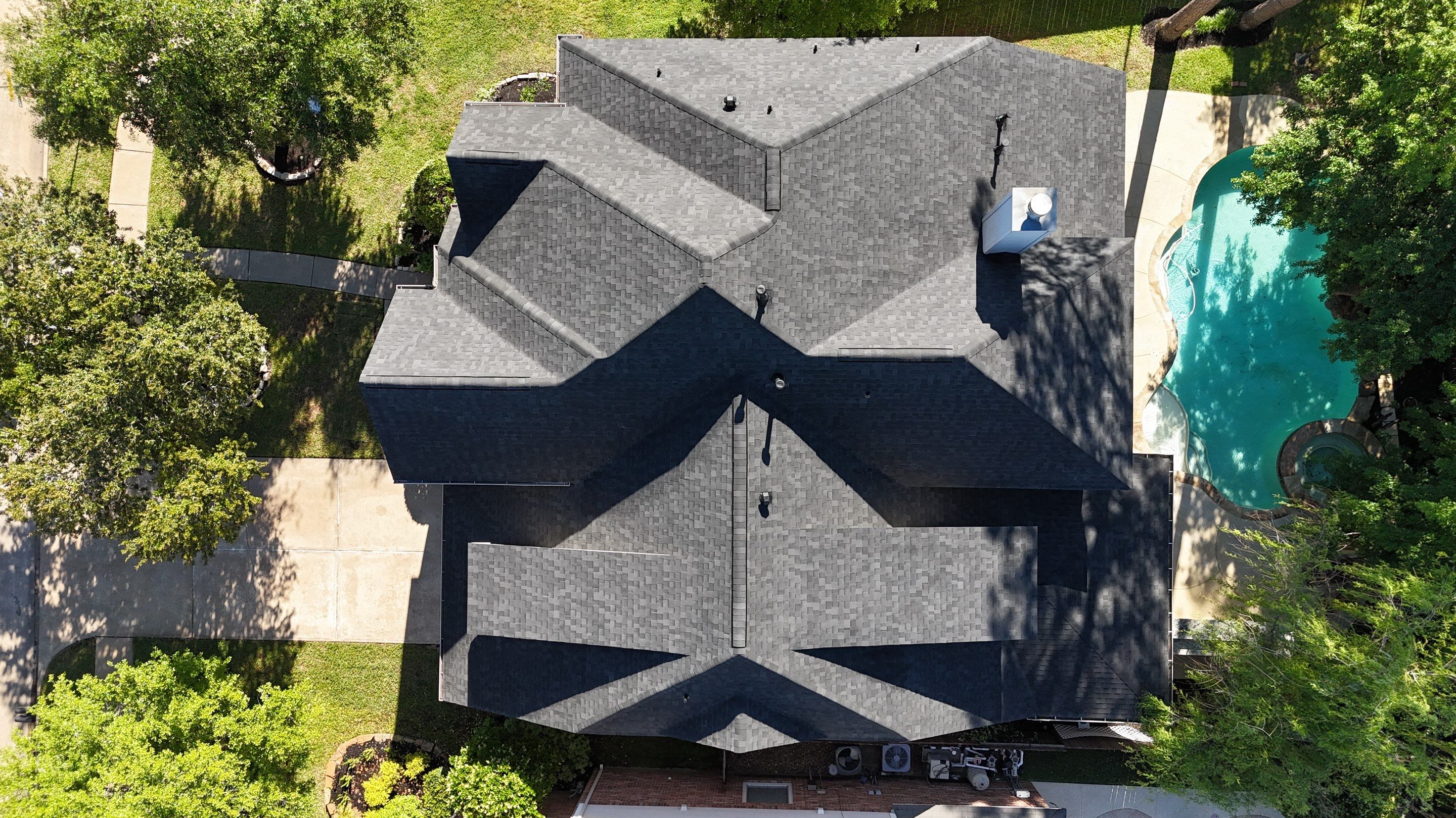 Residential Roofing Installation using Architectural Shingles by Core Four Roofing