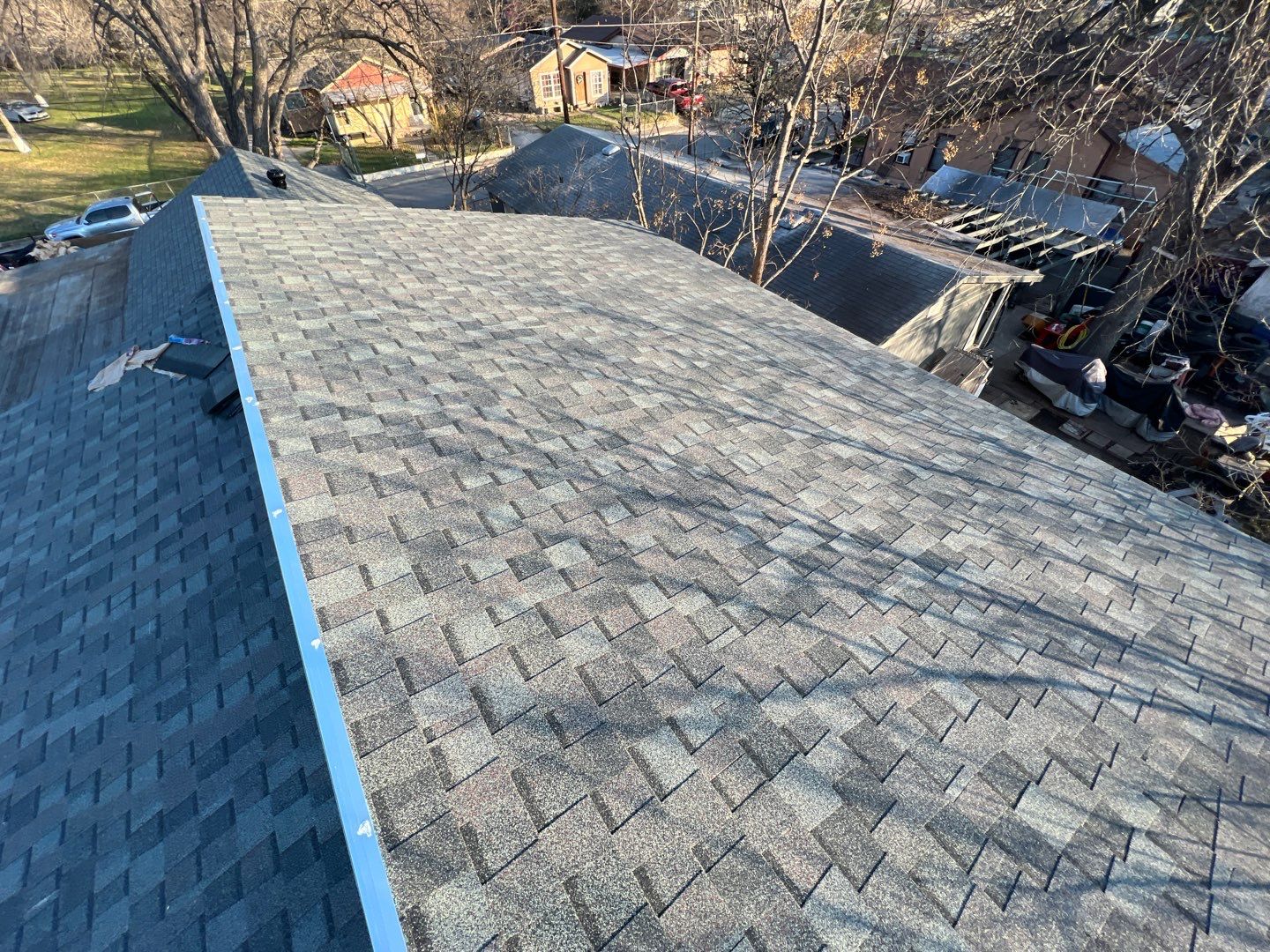 Estate Gray Shingles by Reimagine Roofing