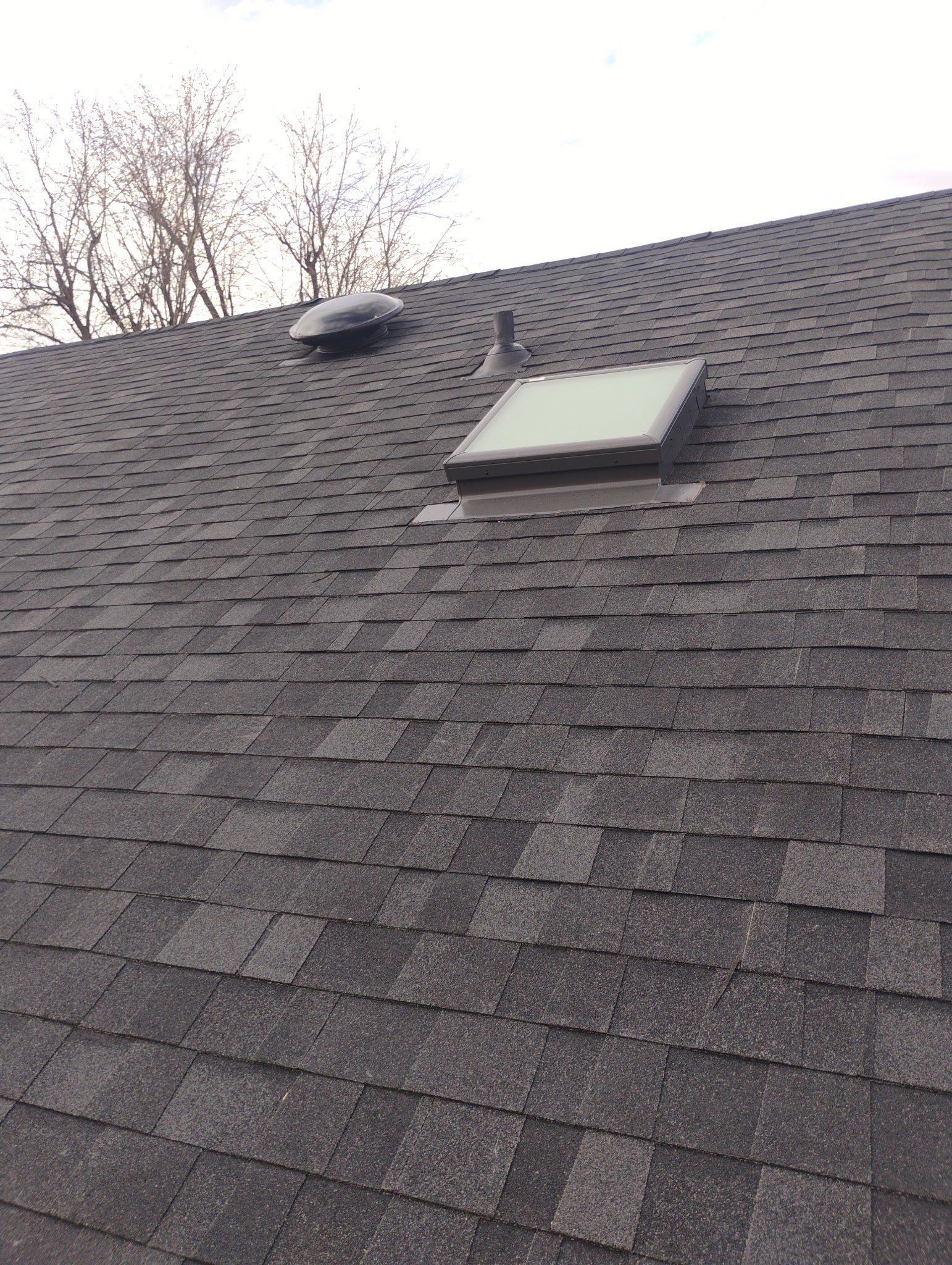 roof replacement & skylight installation & gutter installation in Oklahoma City by McCann's Roofing and Construction