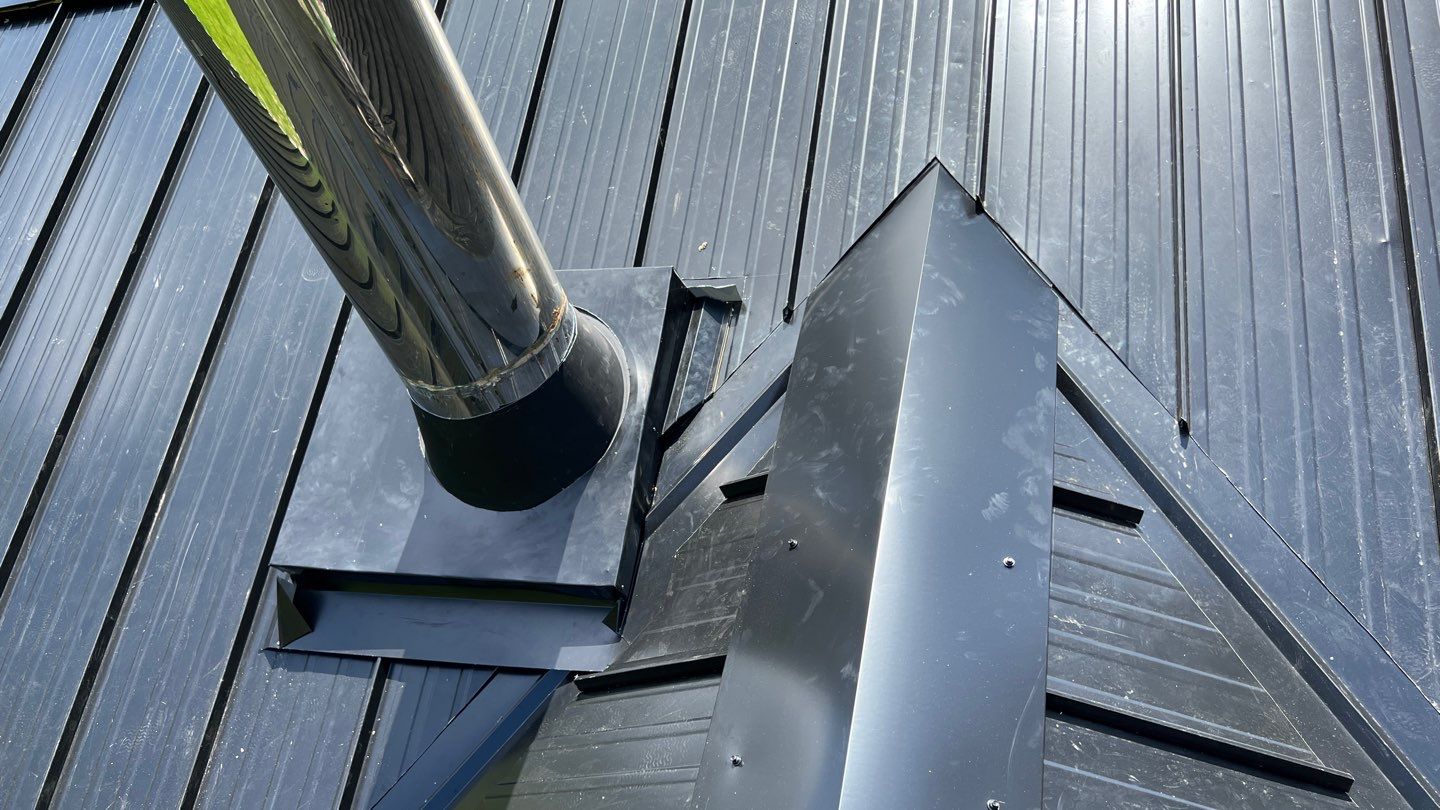 Residential ReRoofing Installation using 12" Prolok metal by Top Notch Roofing Inc