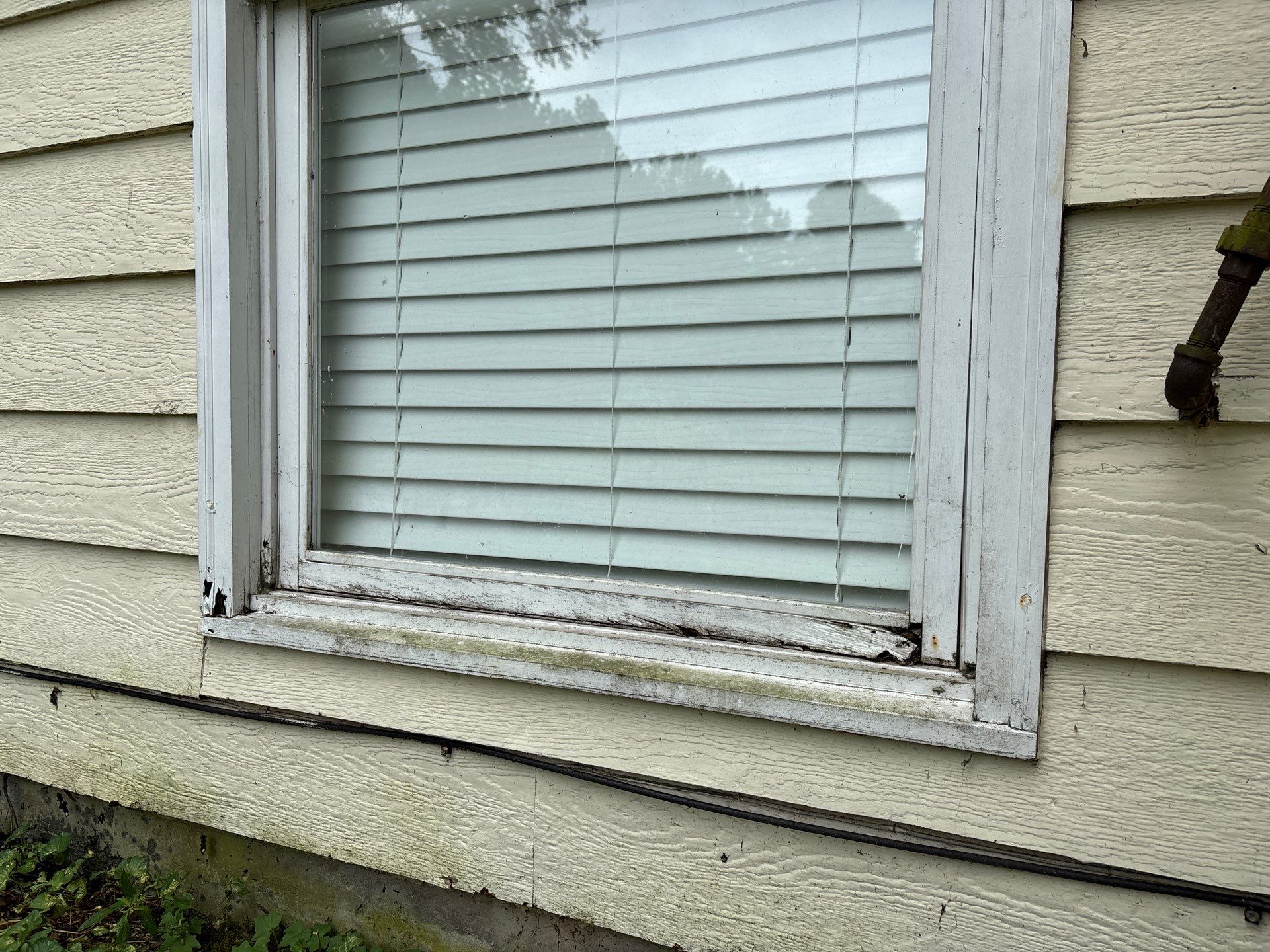 Window Replacement and Siding Installation in Lawrenceville, GA by Nelson Exteriors 