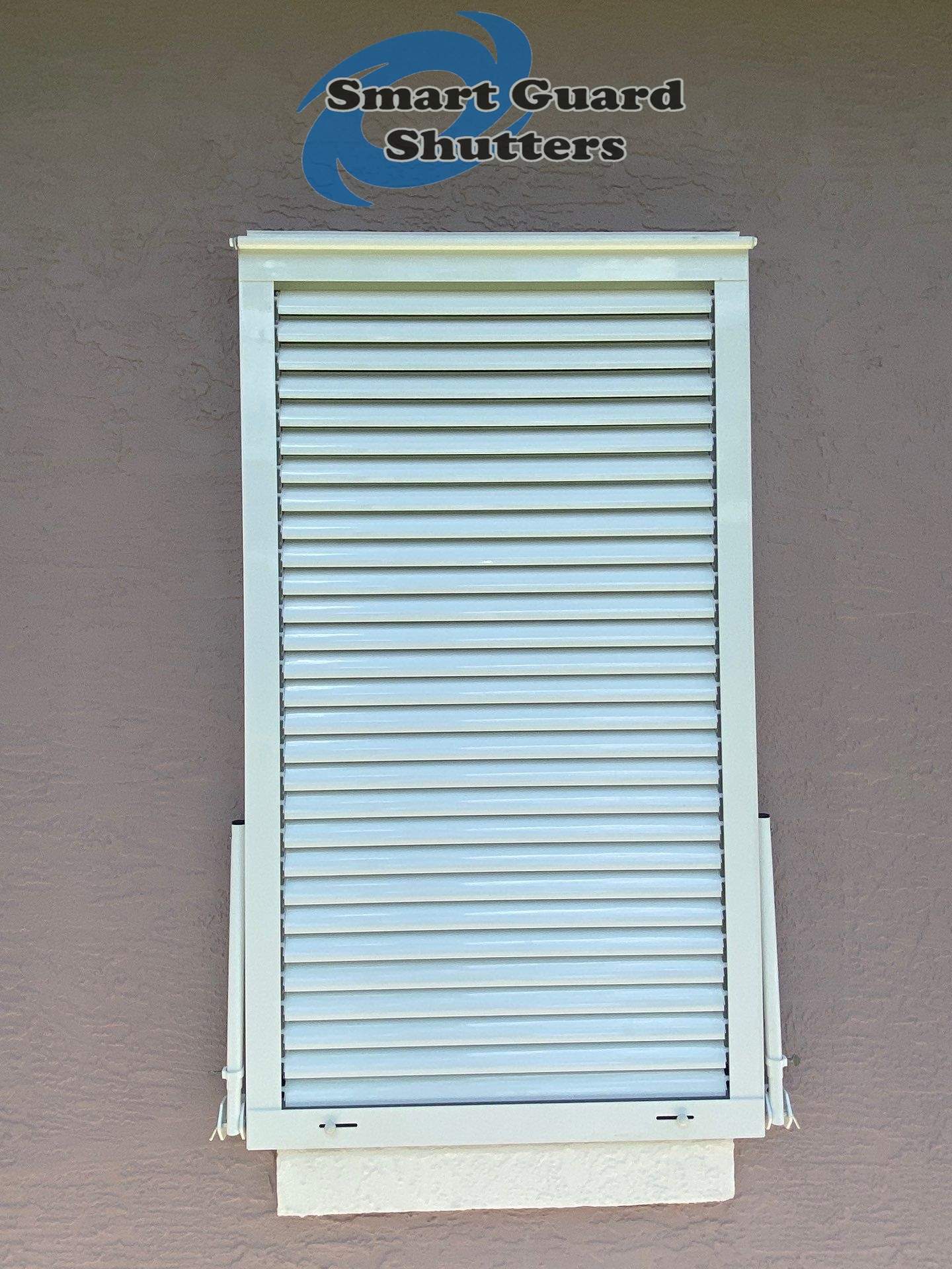 Impact Bahama Shutters in Signal White by Smart Guard Shutters