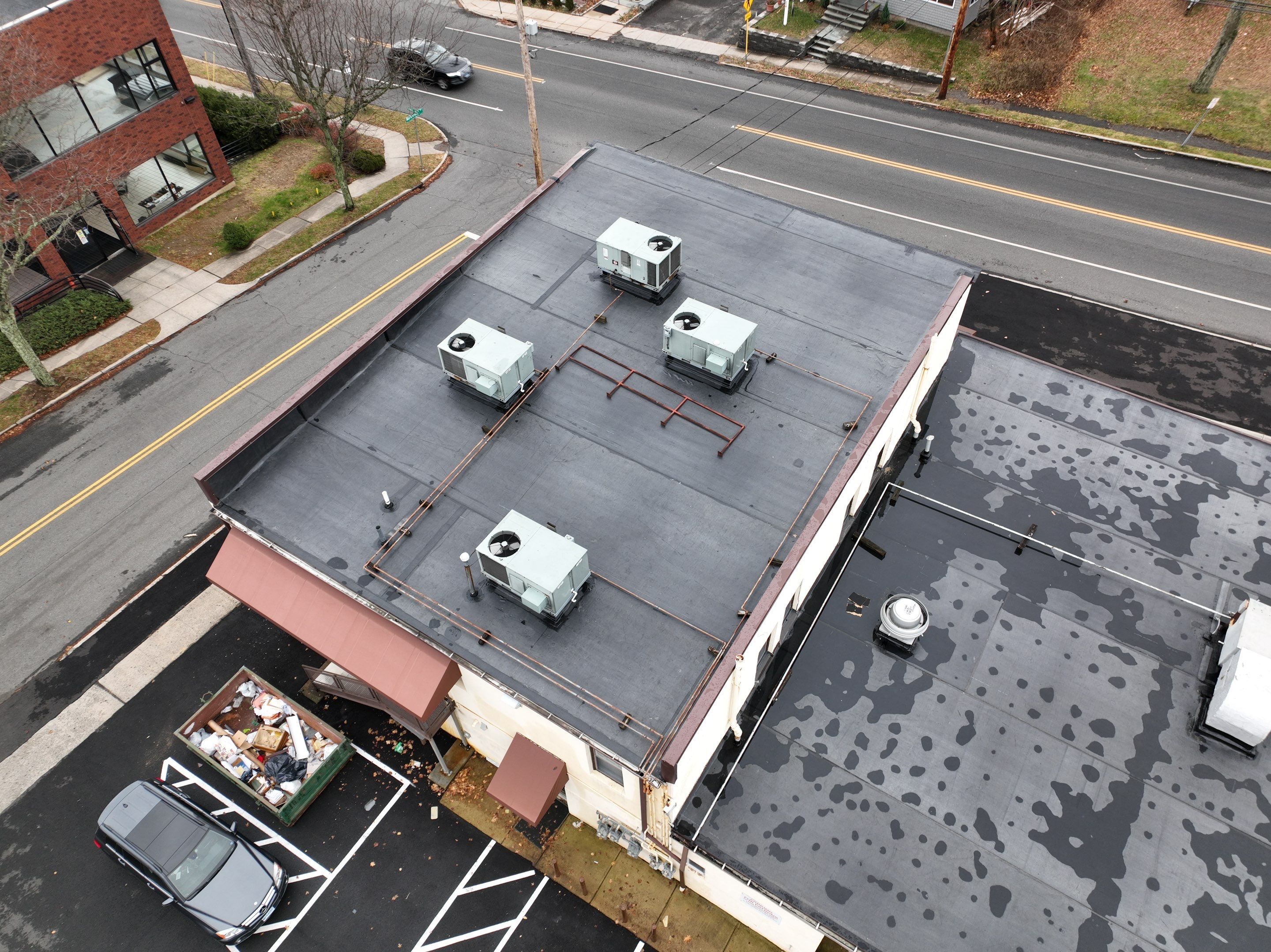 Commercial Roofing Installation using EPDM  by A Plus Exterior