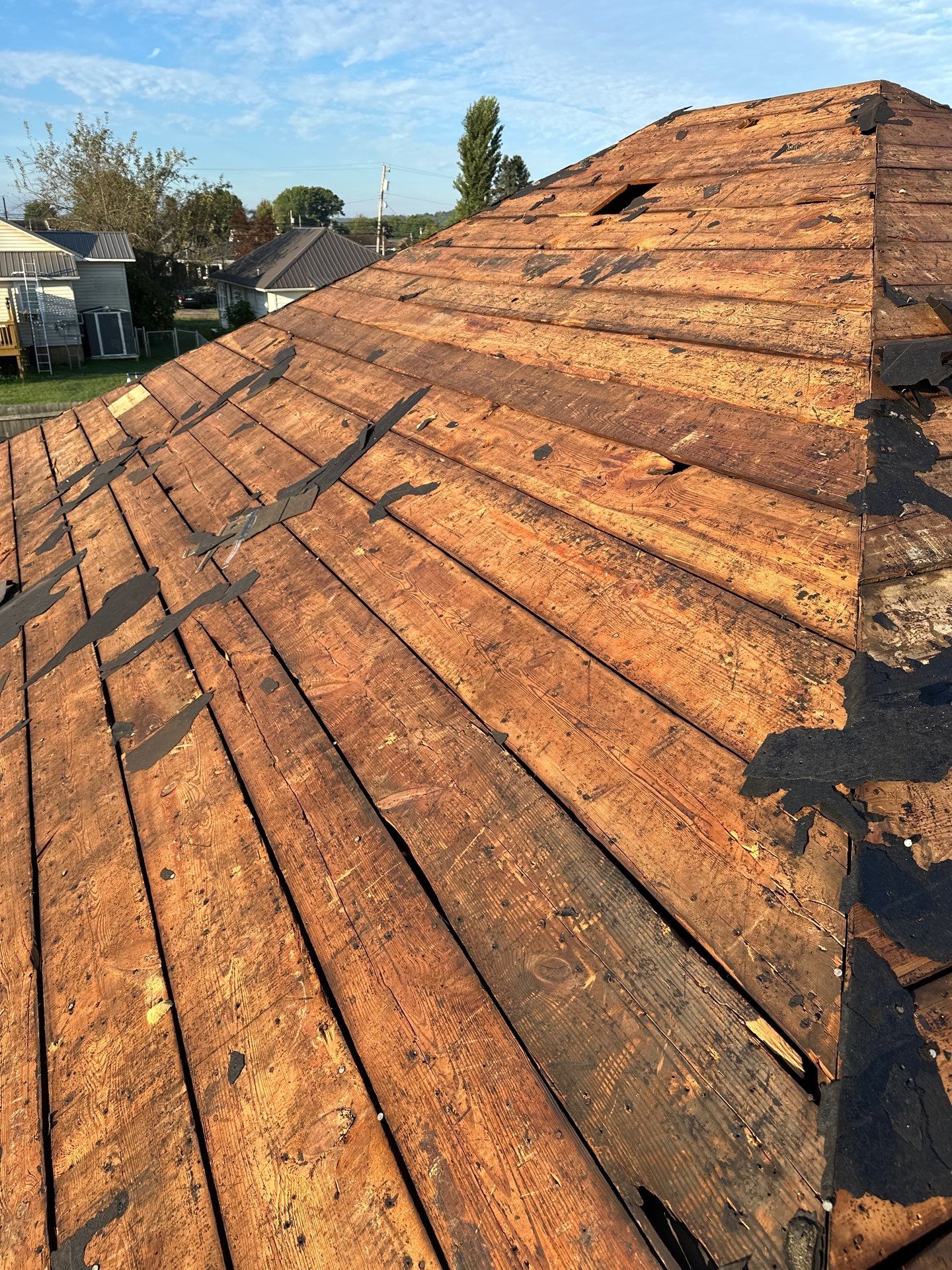 Residential Roofing Installation using GAF Timberline HDZ Charcoal by Rainstoppers Roofing