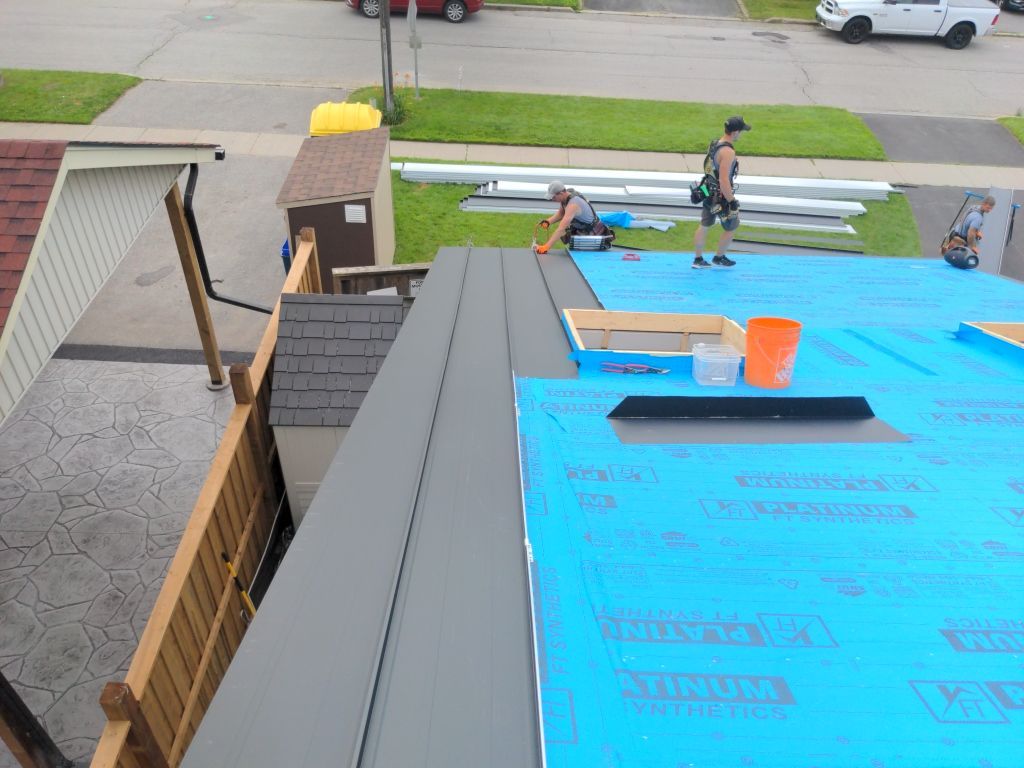 Residential Roofing Installation using 16" Standing Seam Panels by Jay Carter Roofing & Sheet Metal