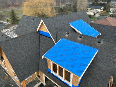 Residential Roofing Installation using Malarky Vista Shingles and Prolok Metal