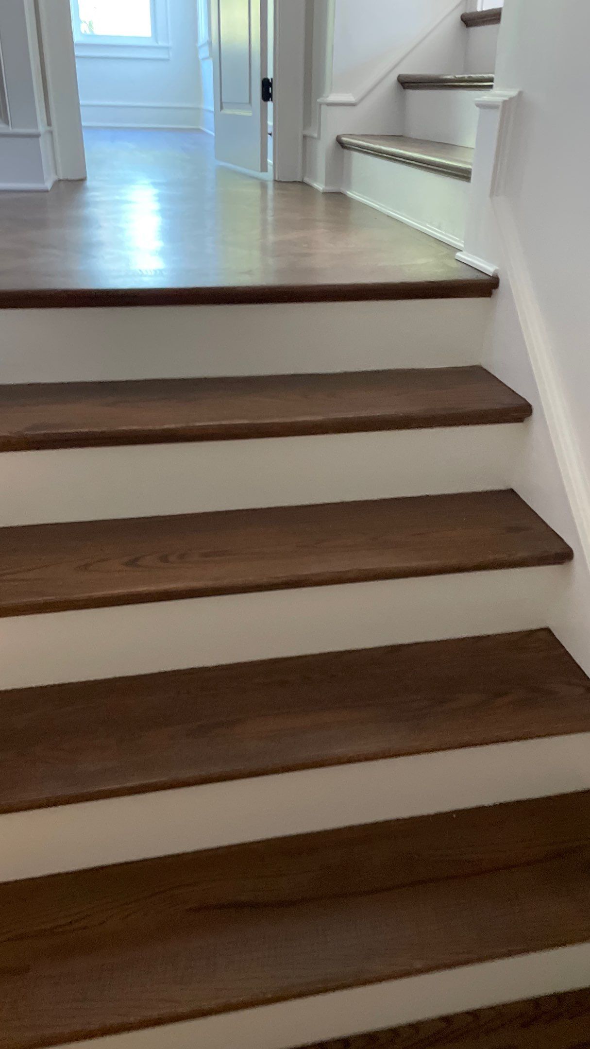 Herringbone Wood Hallway and Rooms by Footprints Floors of Coastal Carolina