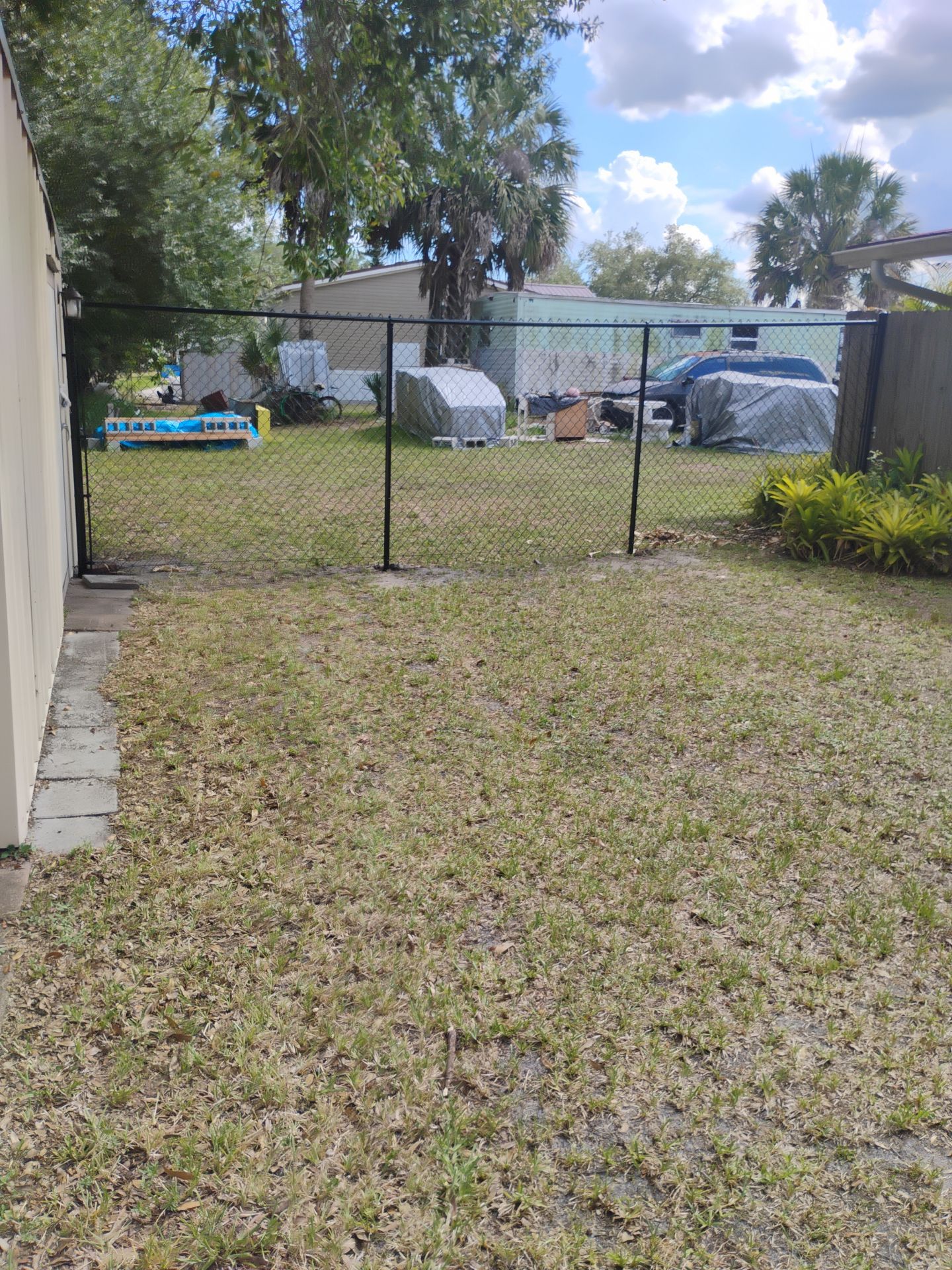 Black Vinyl Chain Link Fence Installation in Arcadia Florida by True Fence LLC