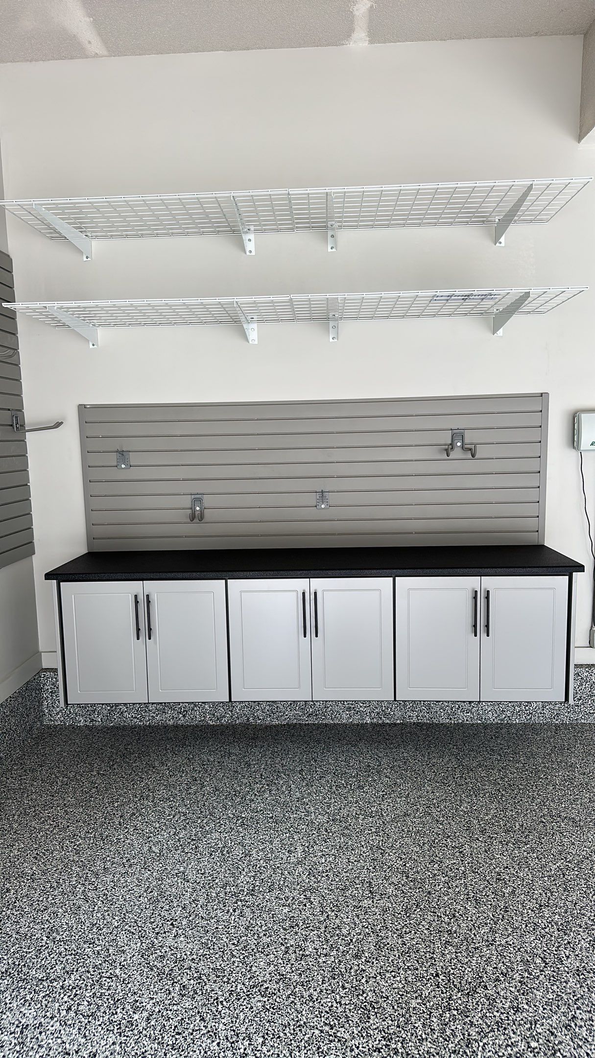 Julie H. upgraded her garage with our cabinets and wall storage options  by Banner Garage