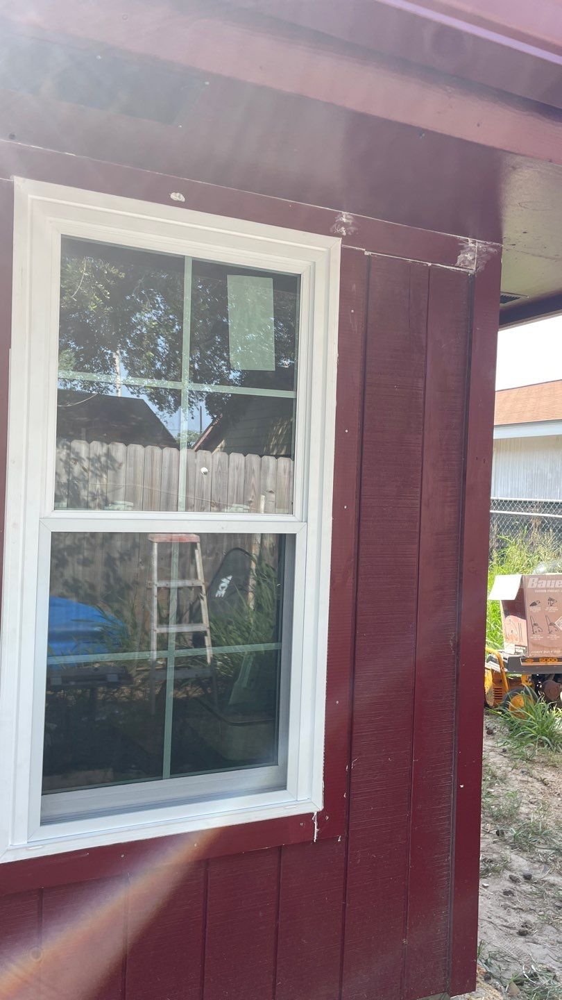 Black and white and red all over by Bayfront Roofing and Construction