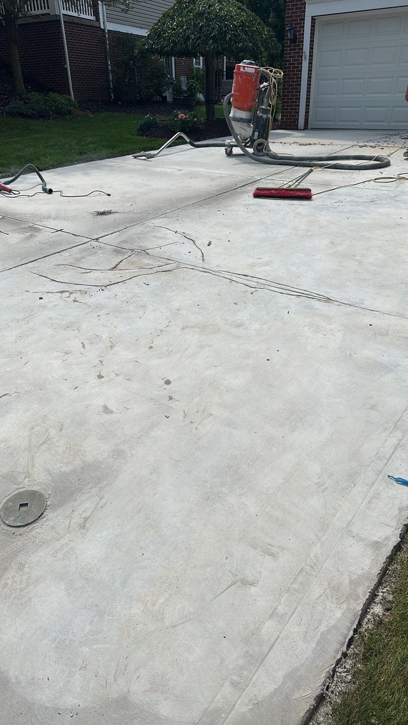 Pool Deck + Driveway + Garage Project in Venetia by Floors in a Day, Inc