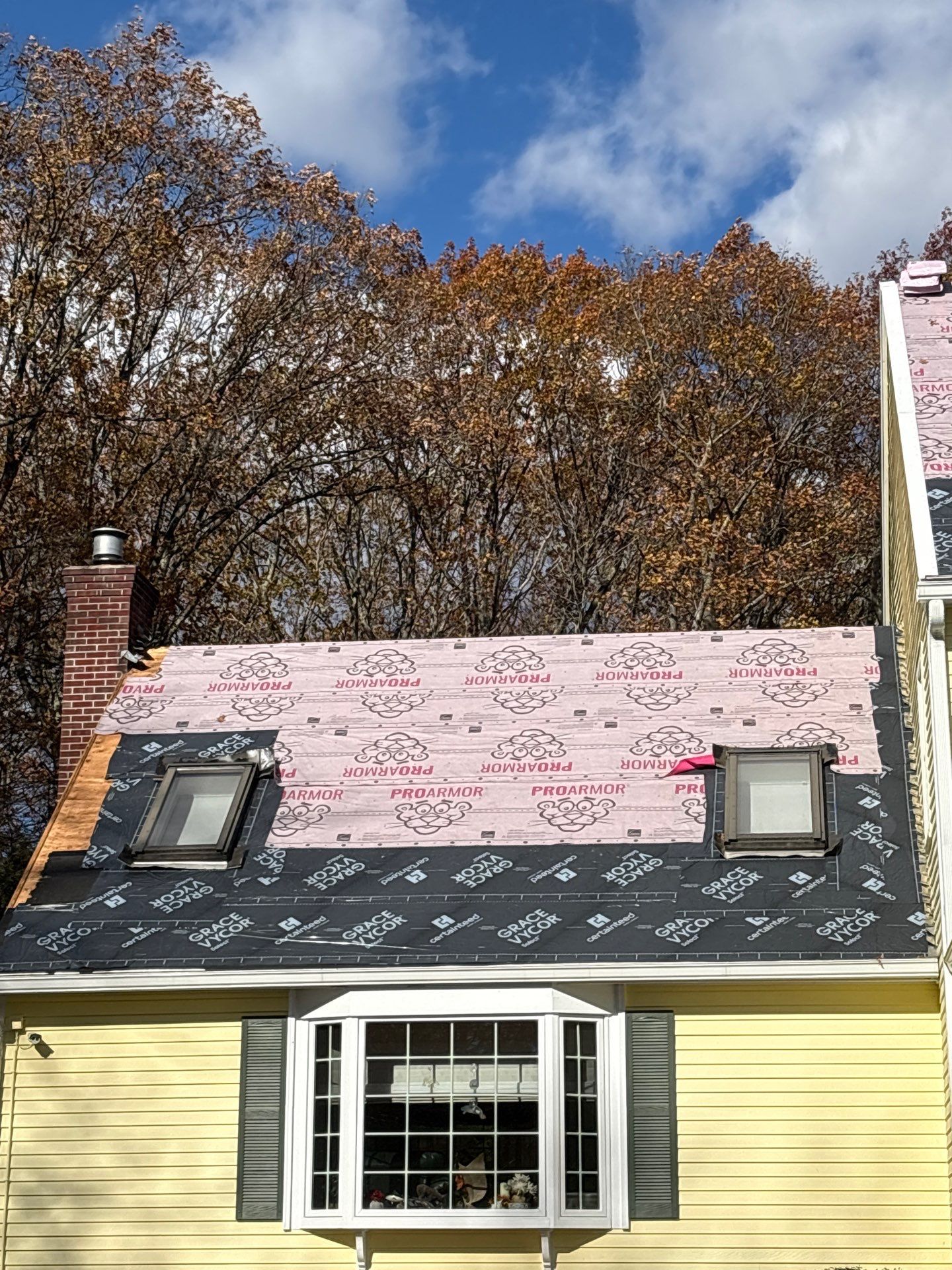 Chelmsford Premium Roof: Onyx Black Shingles with Standing Seam Metal Porch by Mighty Dog Roofing of Greater Middlesex County