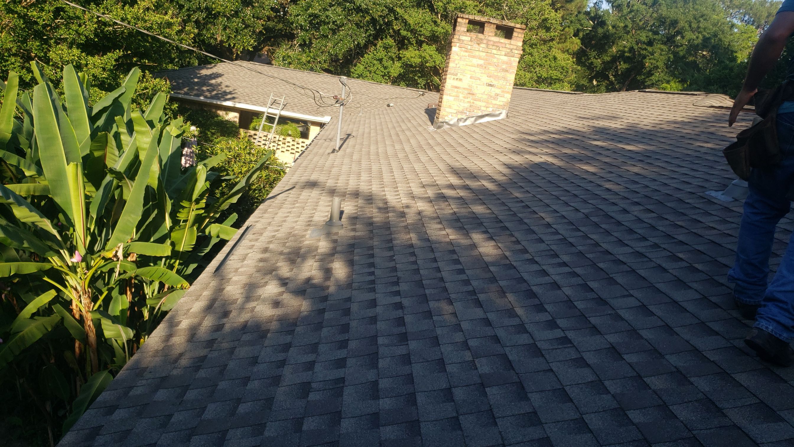 Residential Roofing Installation using Roof Replacement by American Roofing & Construction LLC