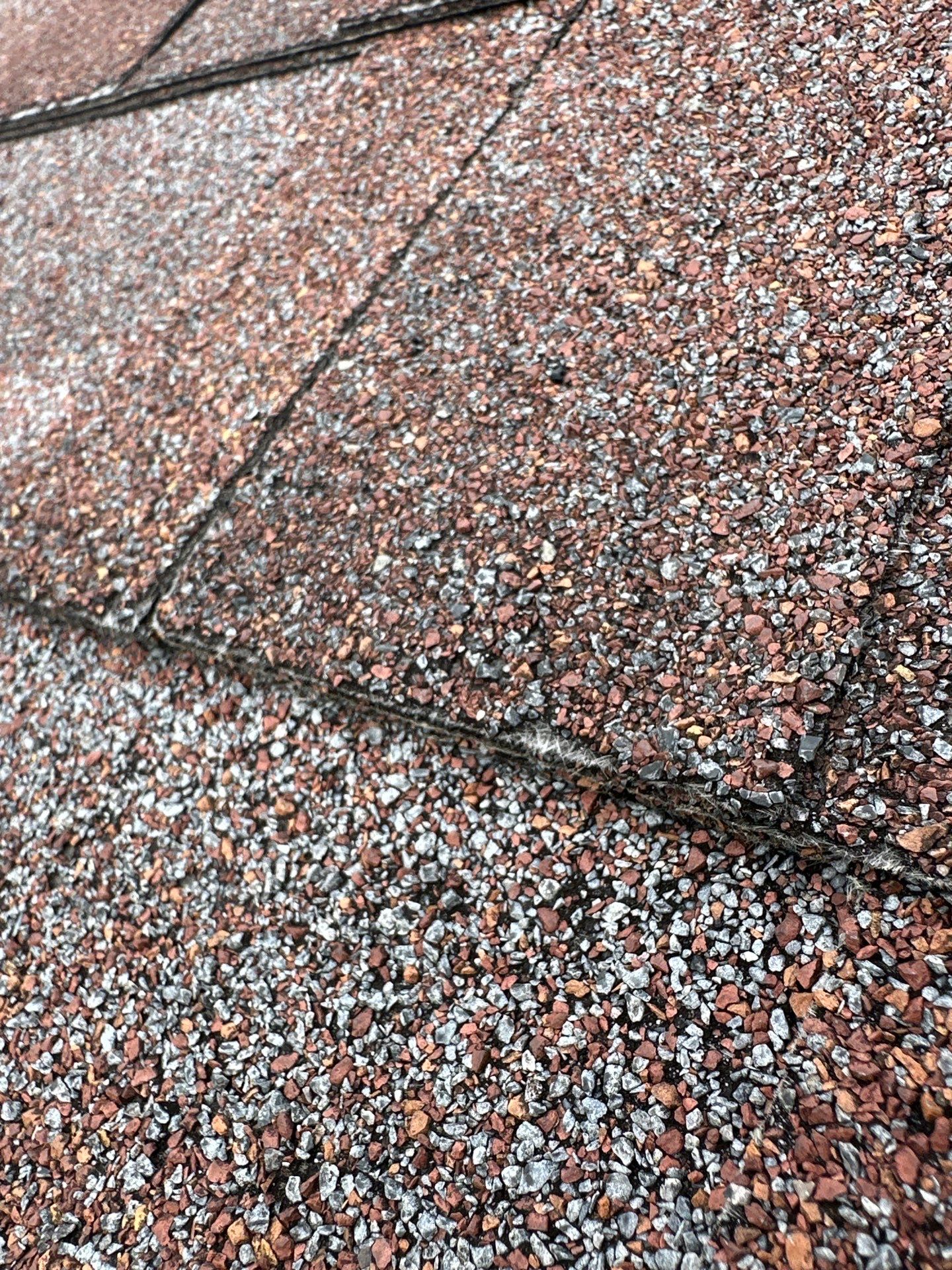 Residential Roofing Installation using Performance Panel Metal - Burgandy by RoofX 