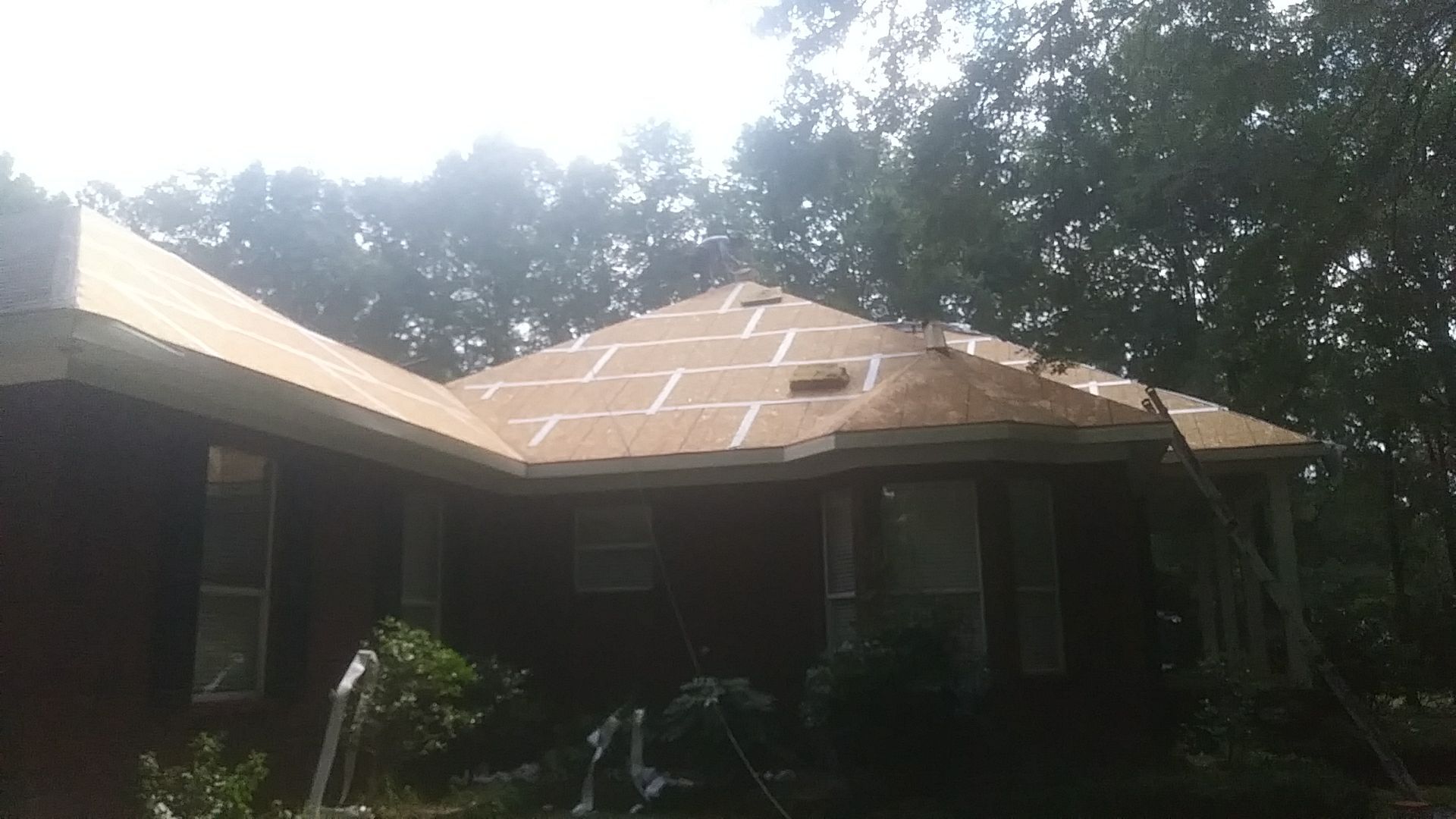 Residential Roofing Installation using Metal roofing by American Roofing & Construction LLC