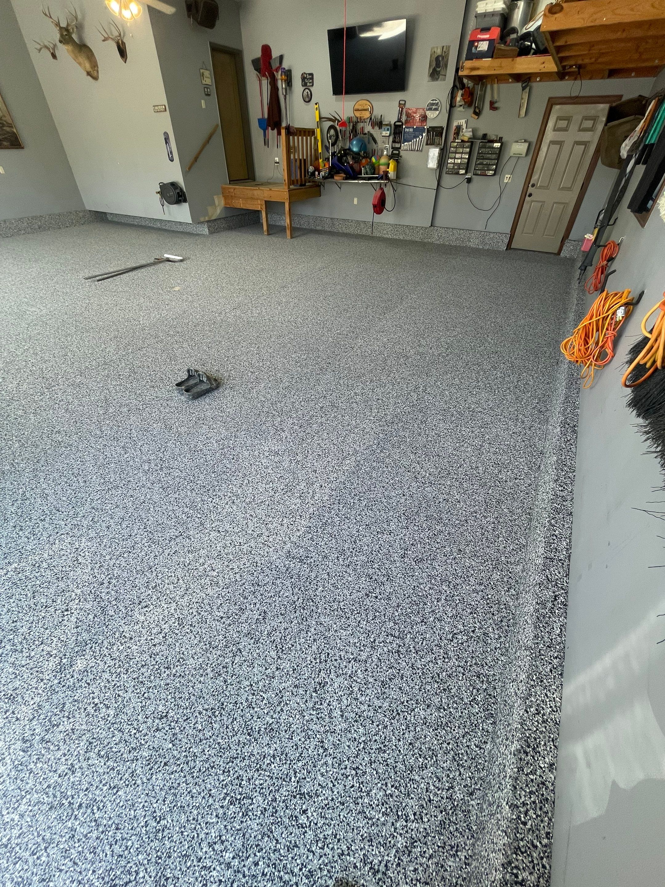 Residential Garage Floor Coating in Sioux Falls by Select Painting, Coatings & Garage Cabinets