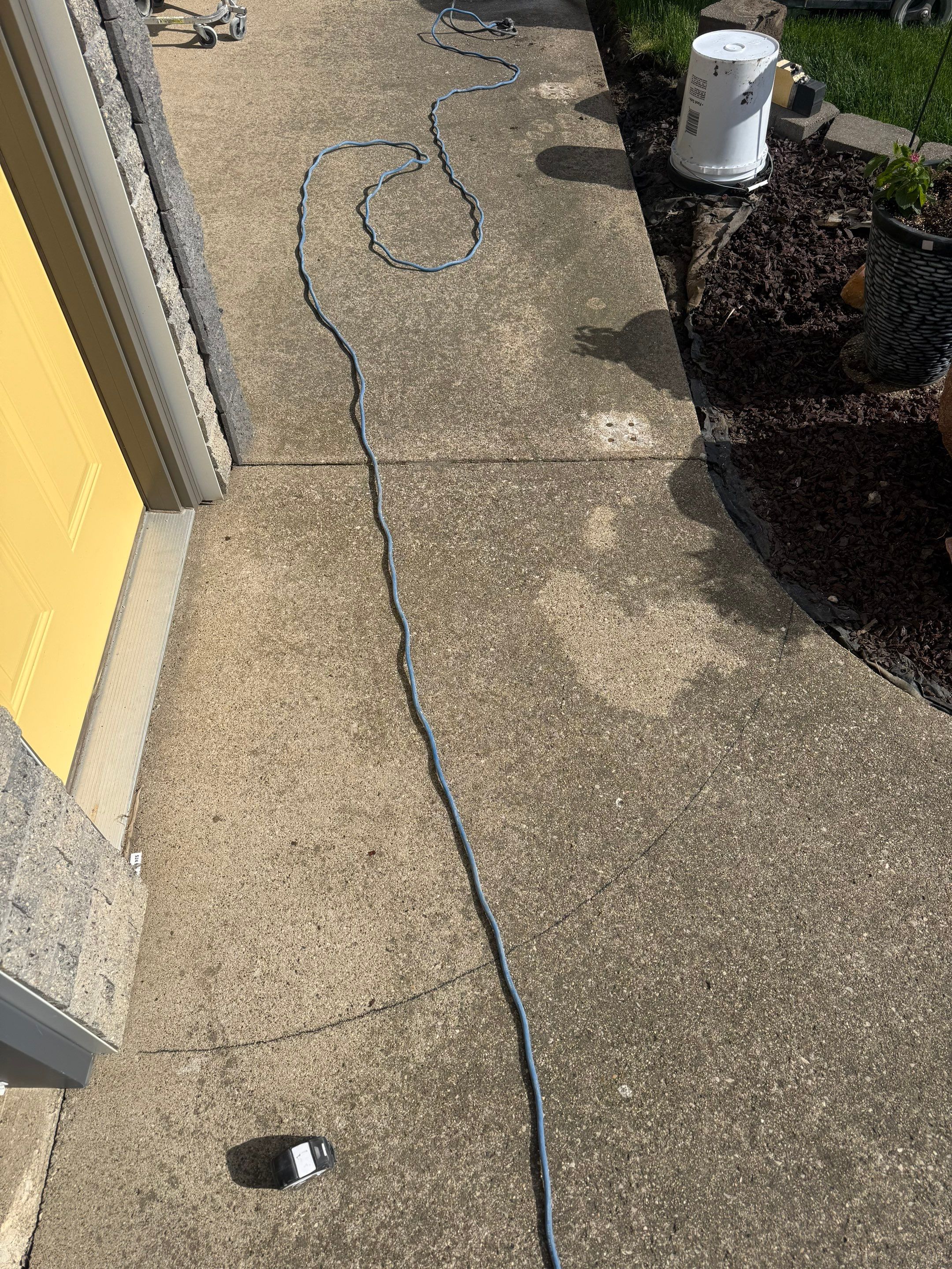 Custom Grey Flake Epoxy Garage Floor Installation in Remsen by Select Painting, Coatings & Garage Cabinets