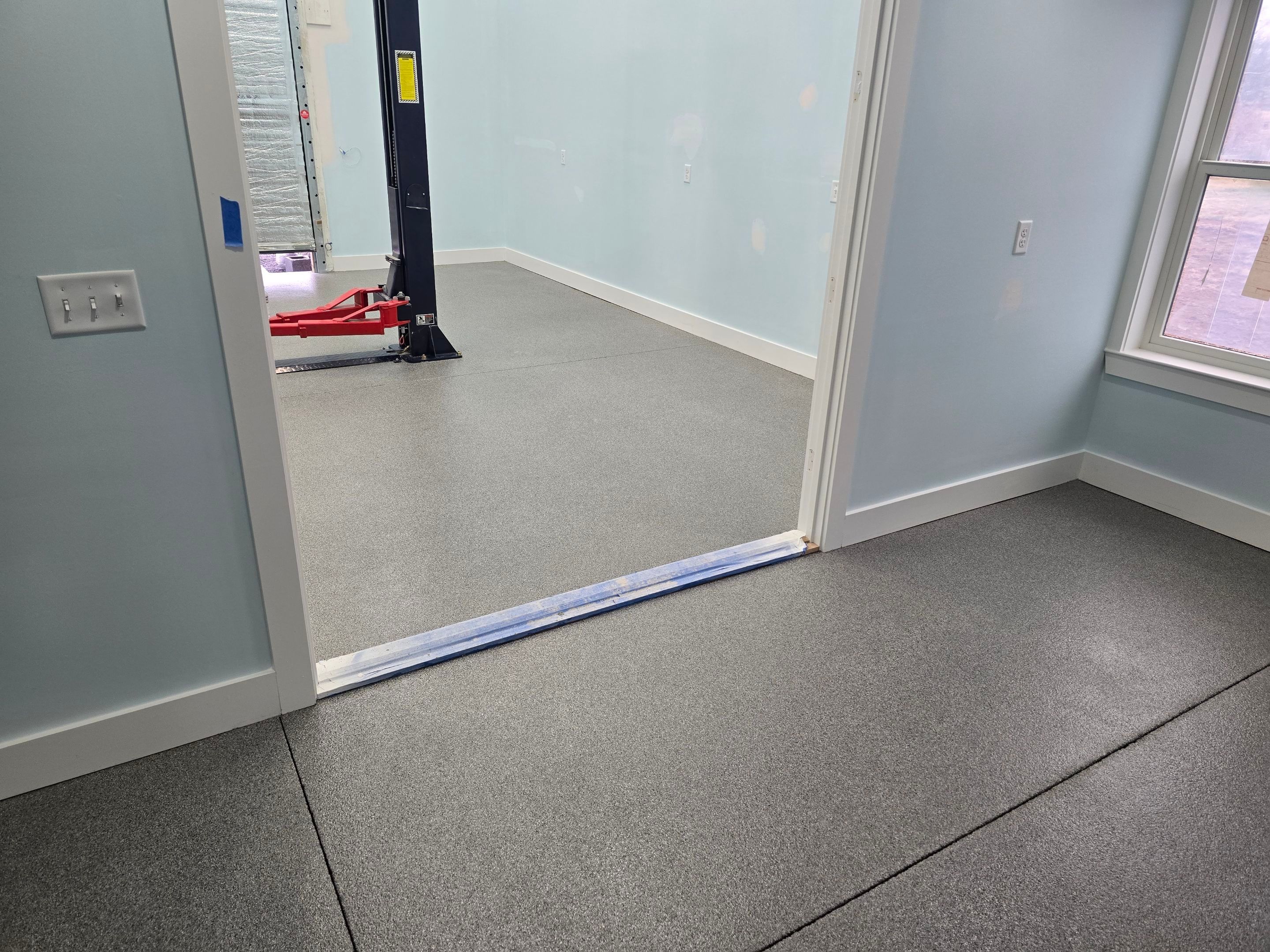 Gym & Garage Using Sea Glass & Keystone by Elite Floor Solutions