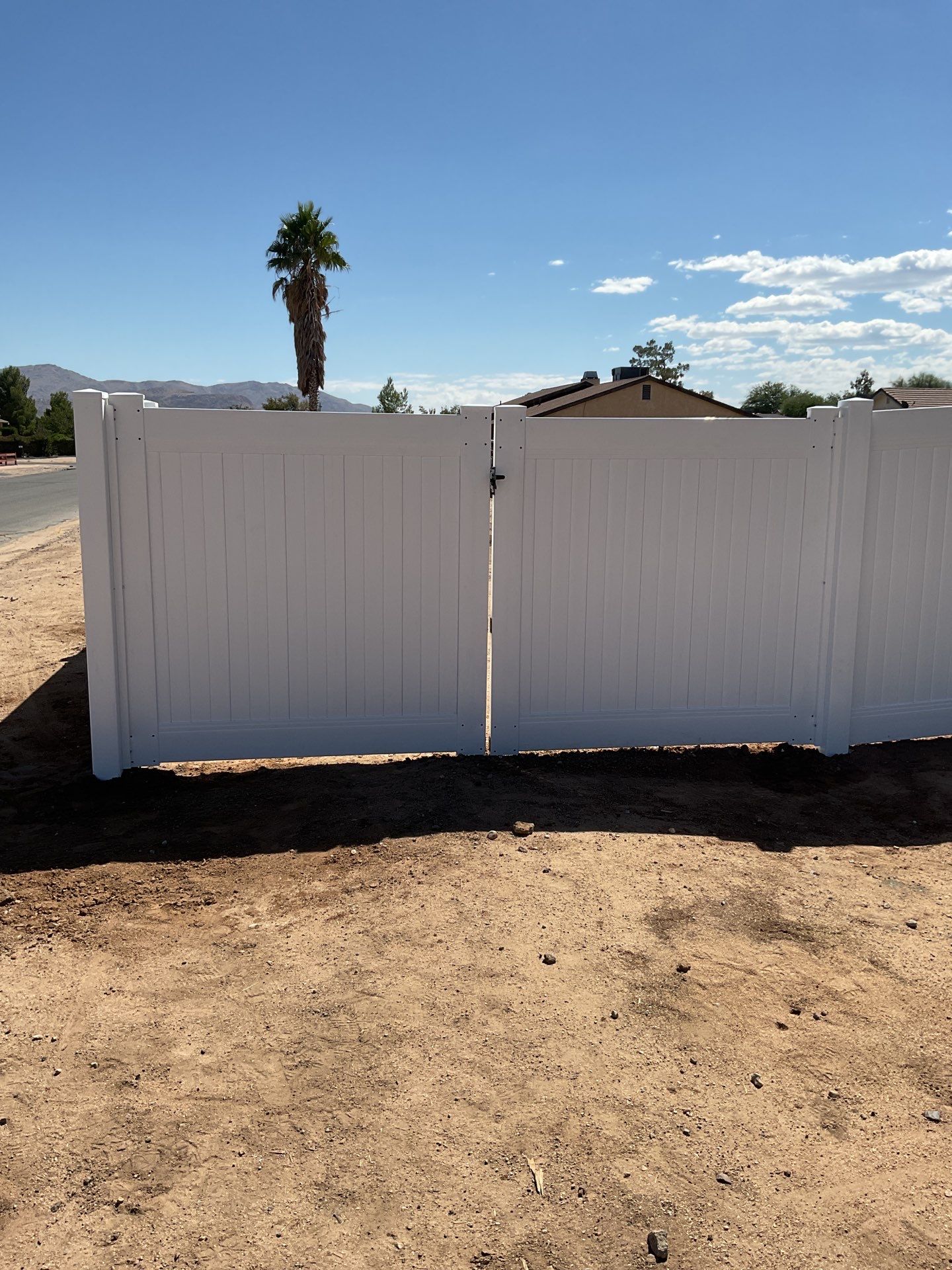 6ft White Privacy Vinyl Fence with Chain-link Fence by Fence Guys Inc.
