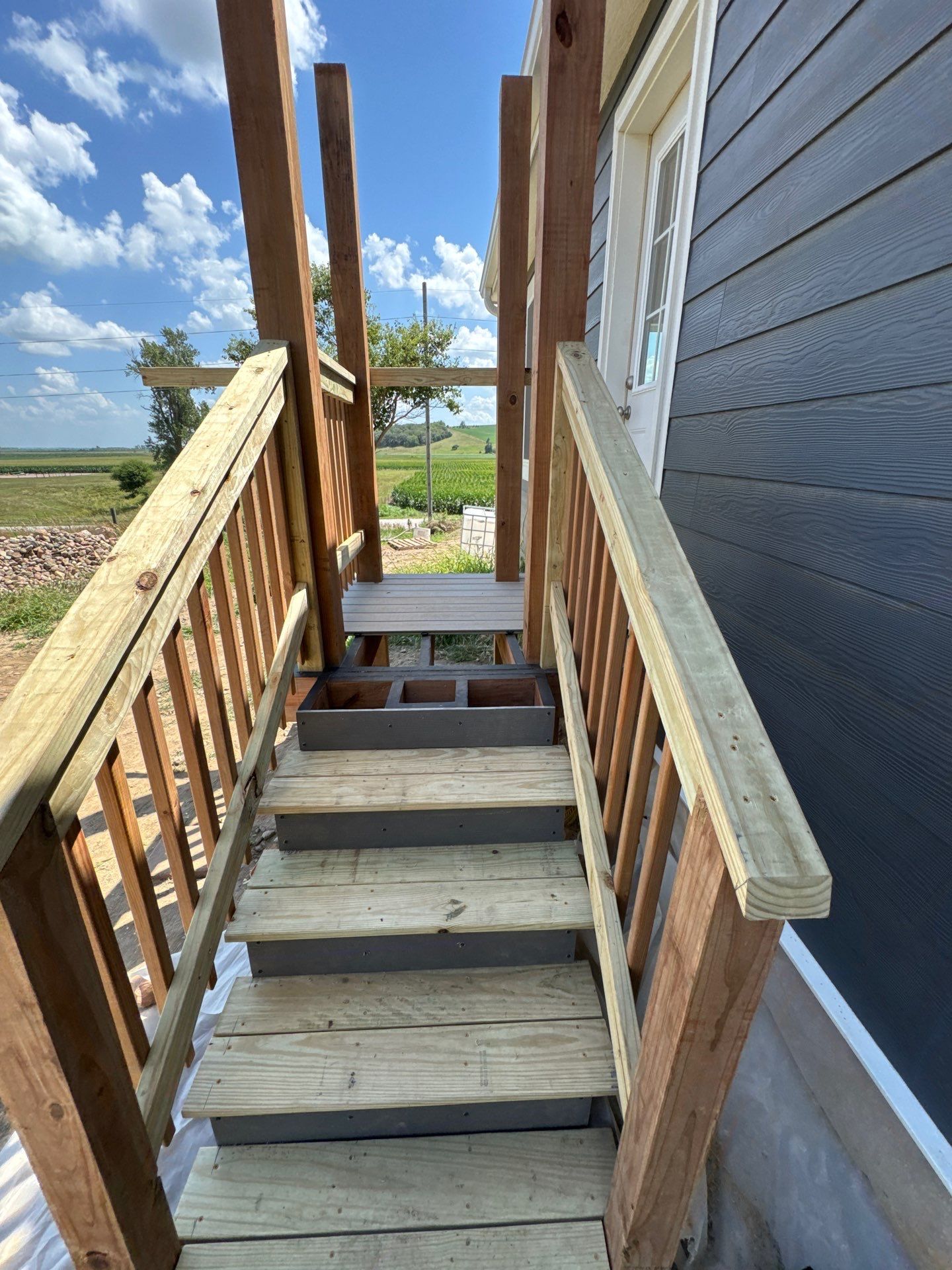 Fiber Cement Siding and Composite Deck in Tekamah, NE by Crows Roofing LLC