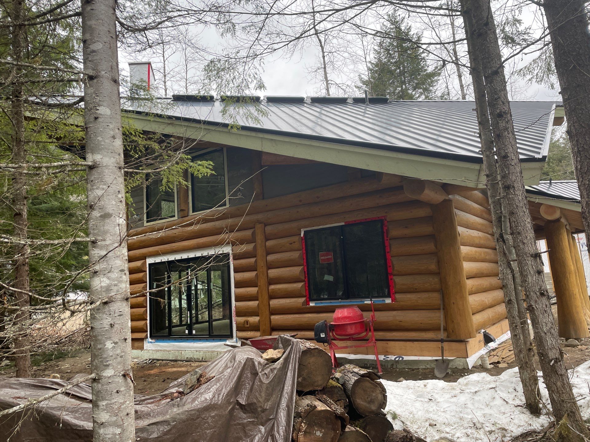 Residential Roofing Installation using 12" Prolok metal  by Top Notch Roofing Inc