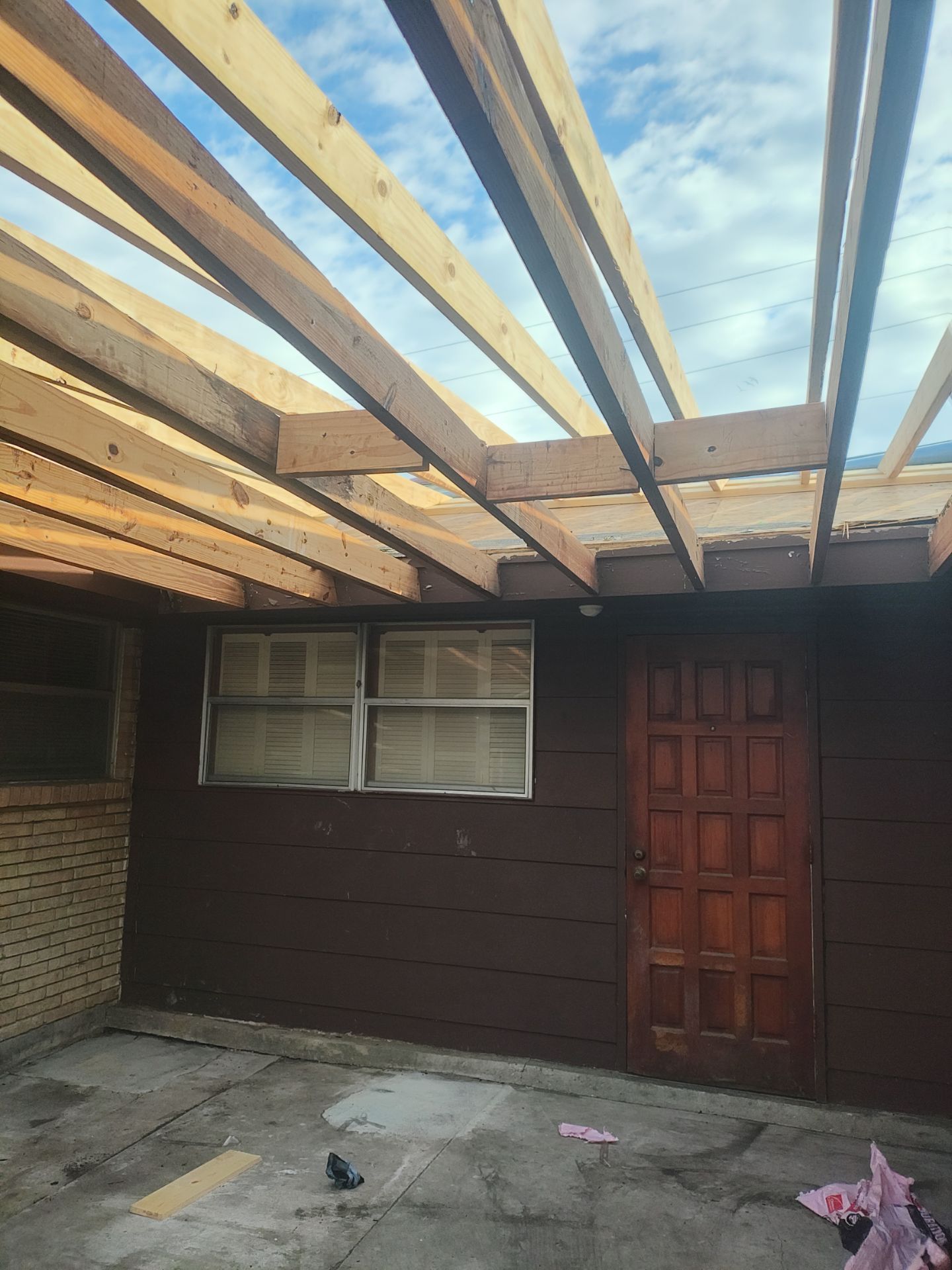 Cover that Patio! by Bayfront Roofing and Construction