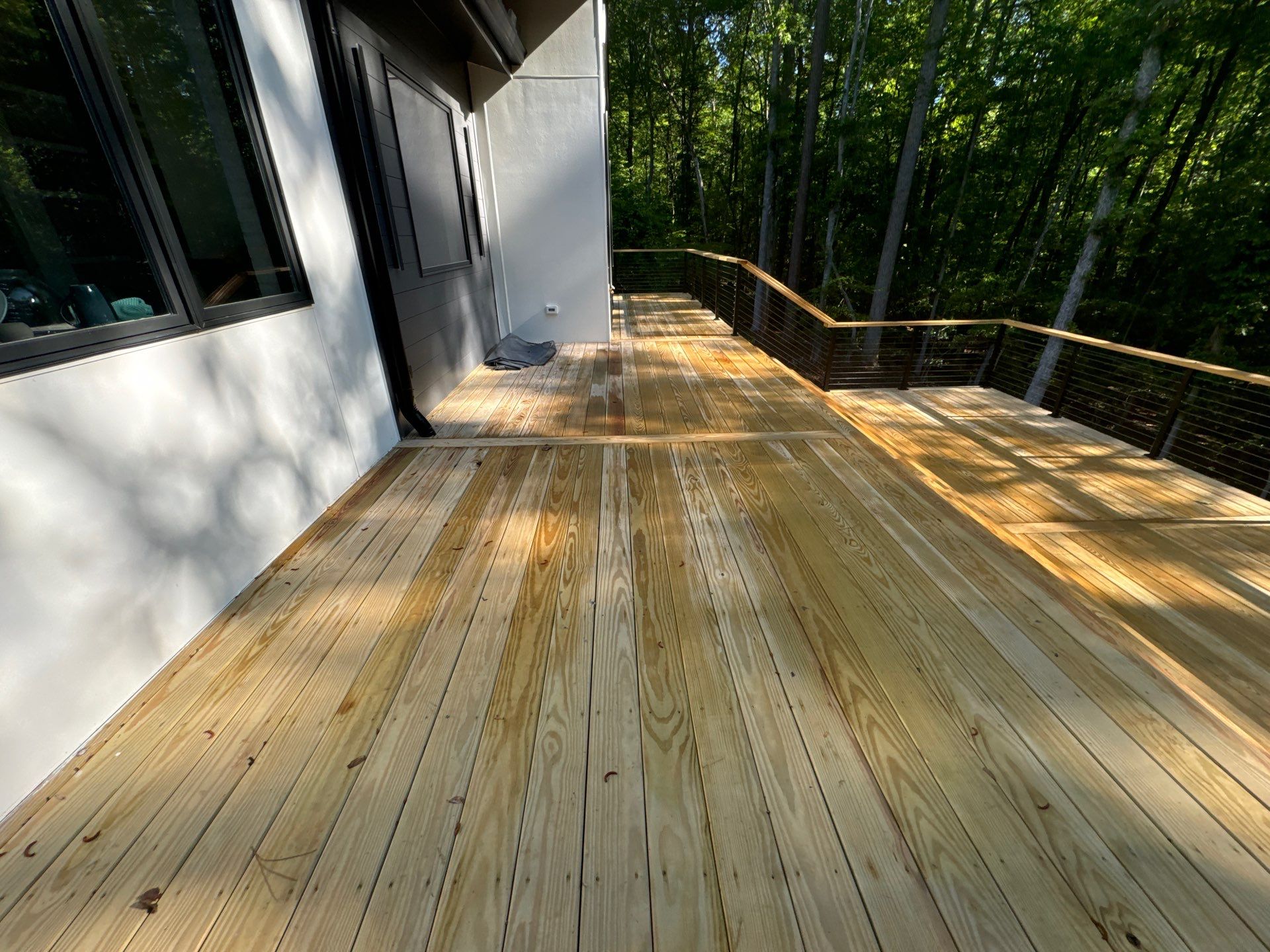 Porch and Deck staining  by GonzalezPainters & Contractors Inc 