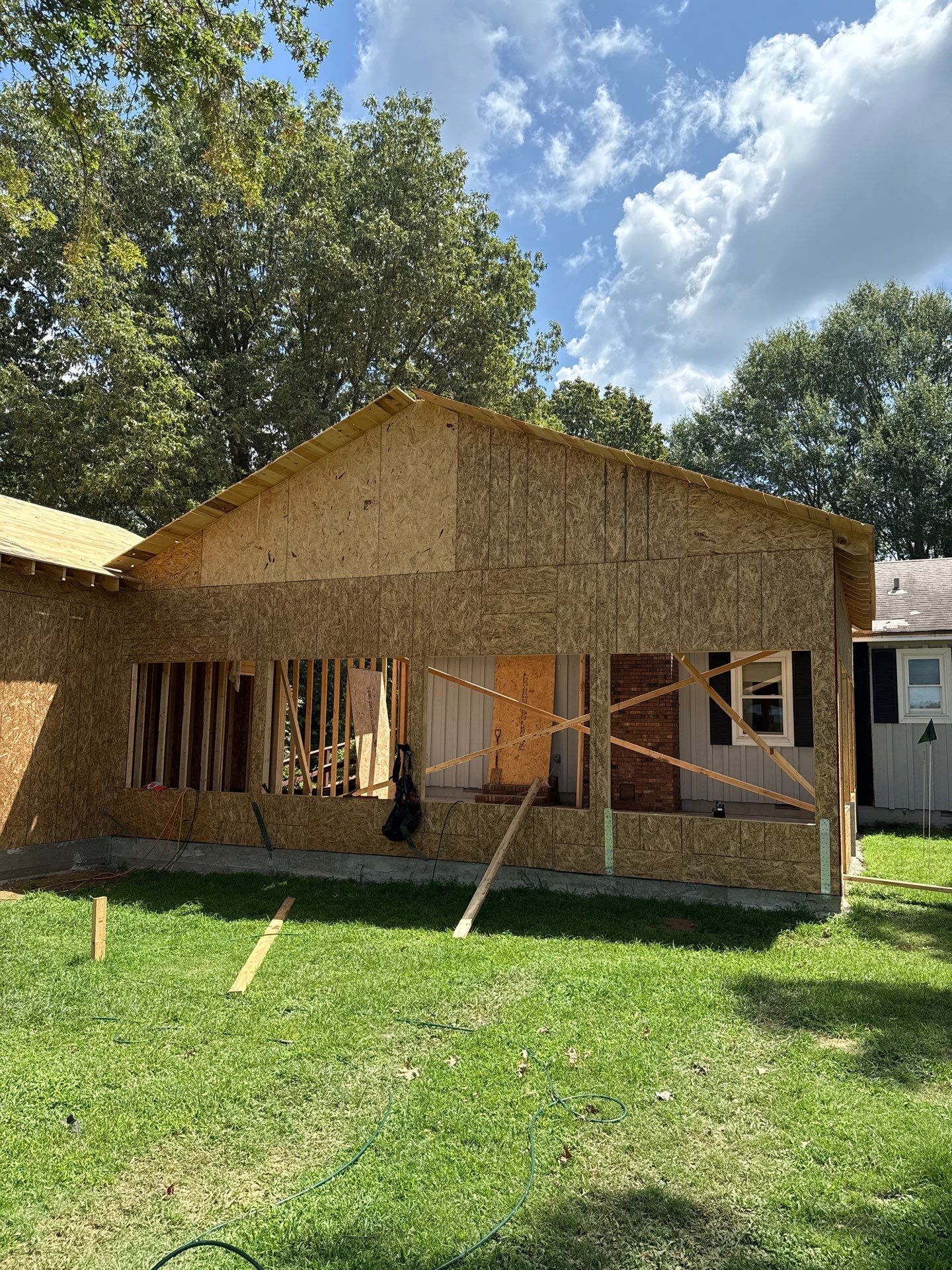 Sunroom and Garage Addition by Skilled Construction LLC