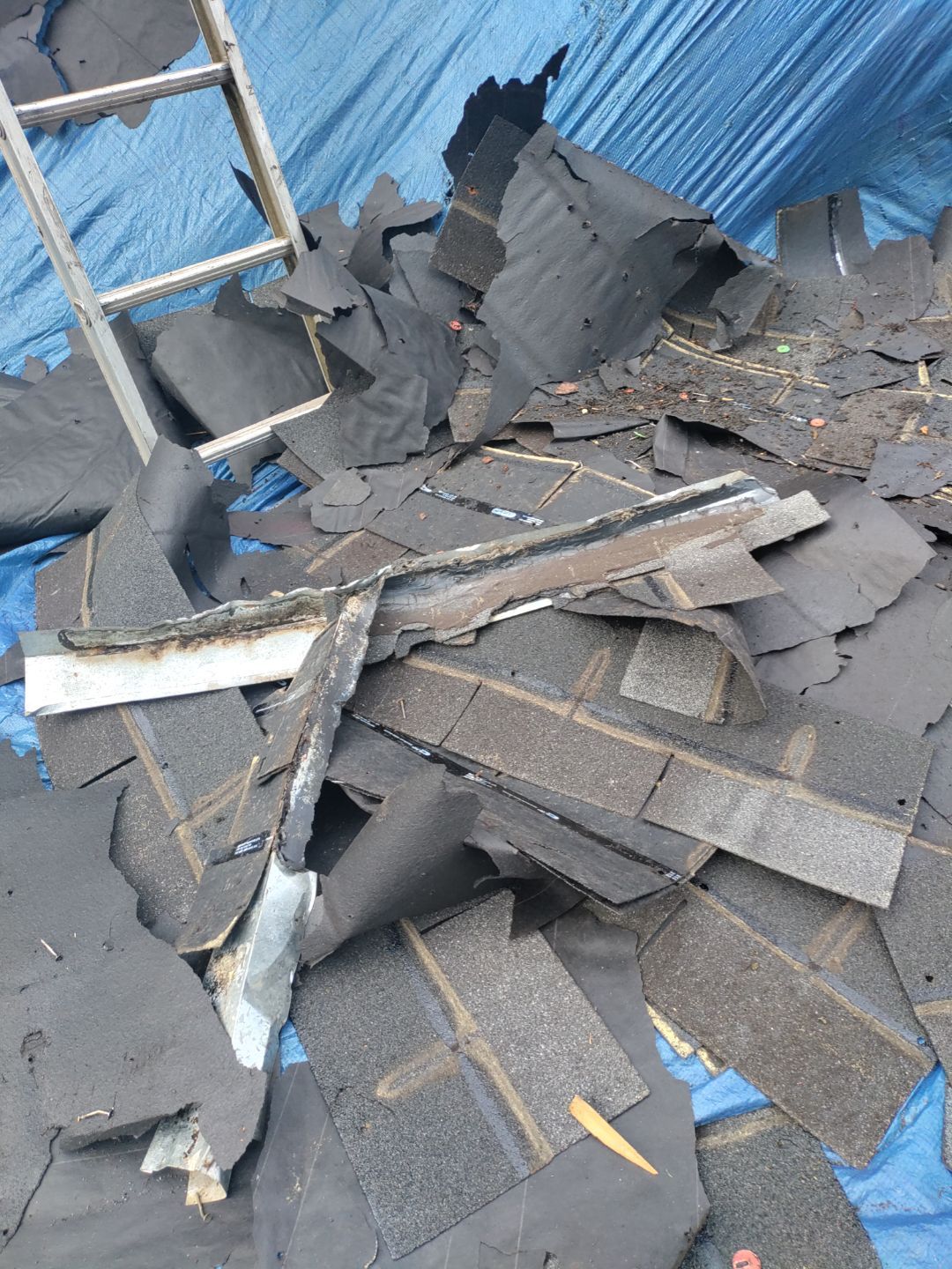 Residential Roof Replacement using Owens Corning Trudef Twilight Black by Inspector Roofing and Restoration