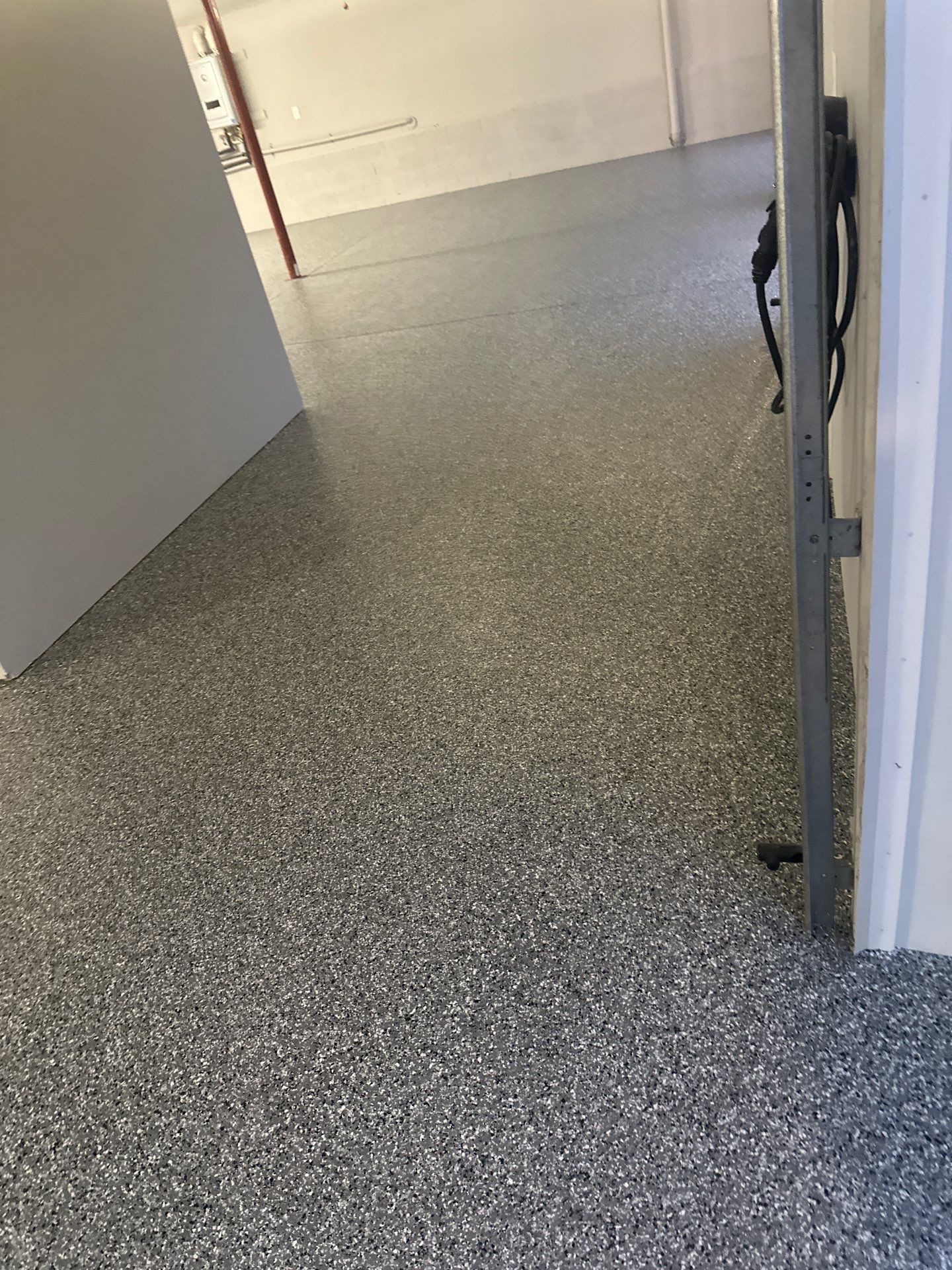 Garage Floor Coating using Wombat by My Garage Floor Guys