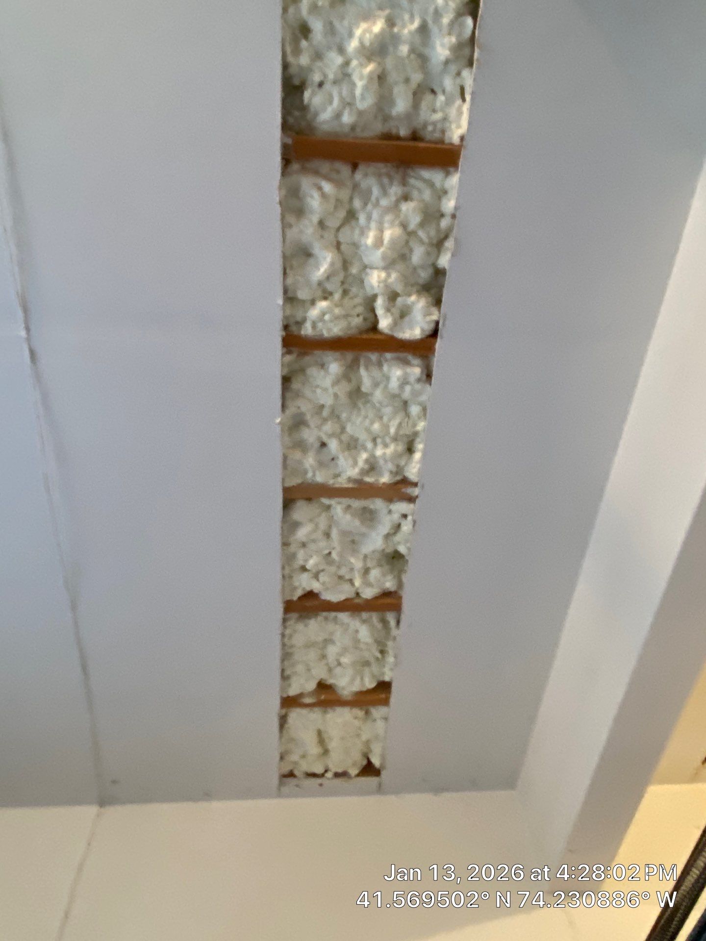 Garage ceiling using open cell spray foam by NYS Foam & Energy