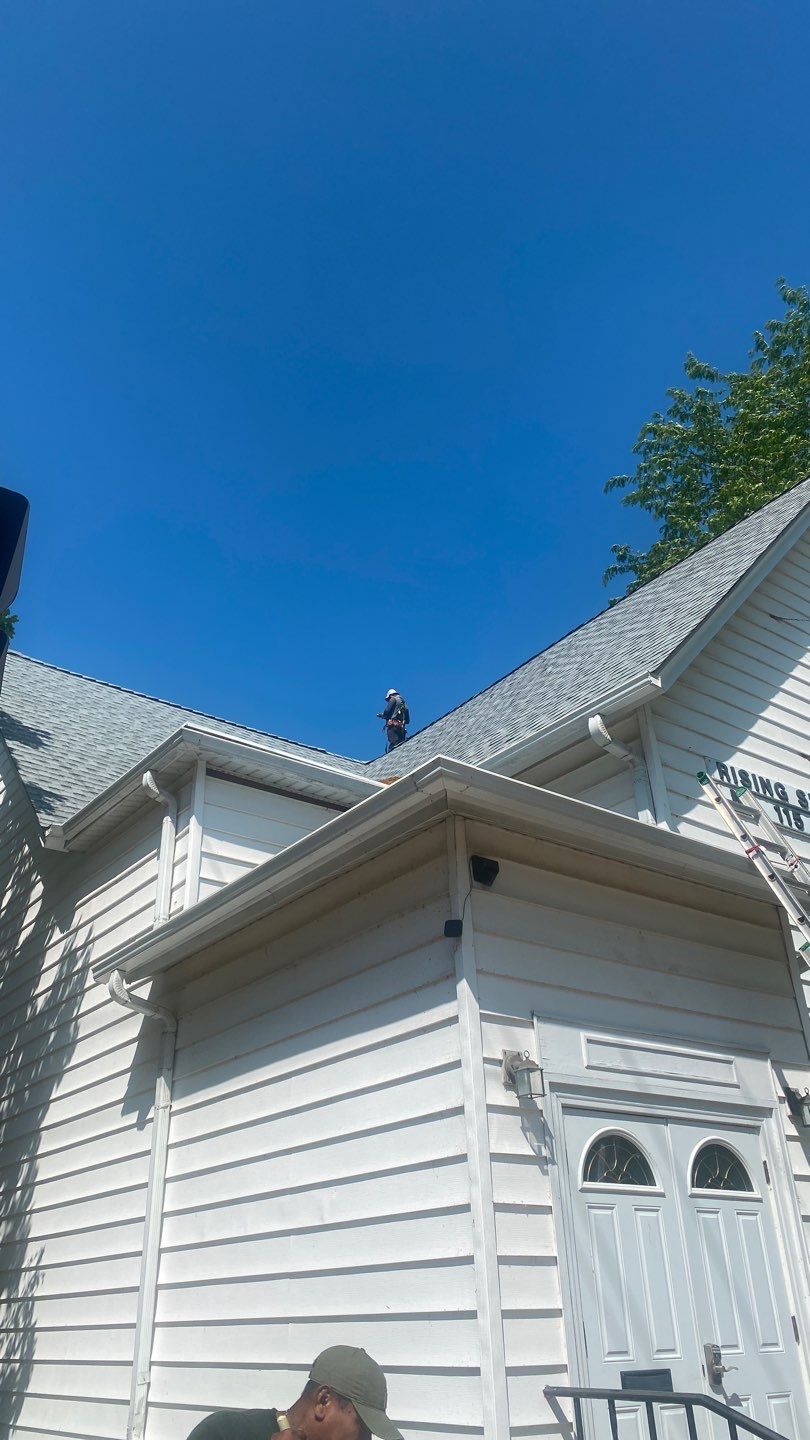 Asphalt Roof Replacement by Custom Installations