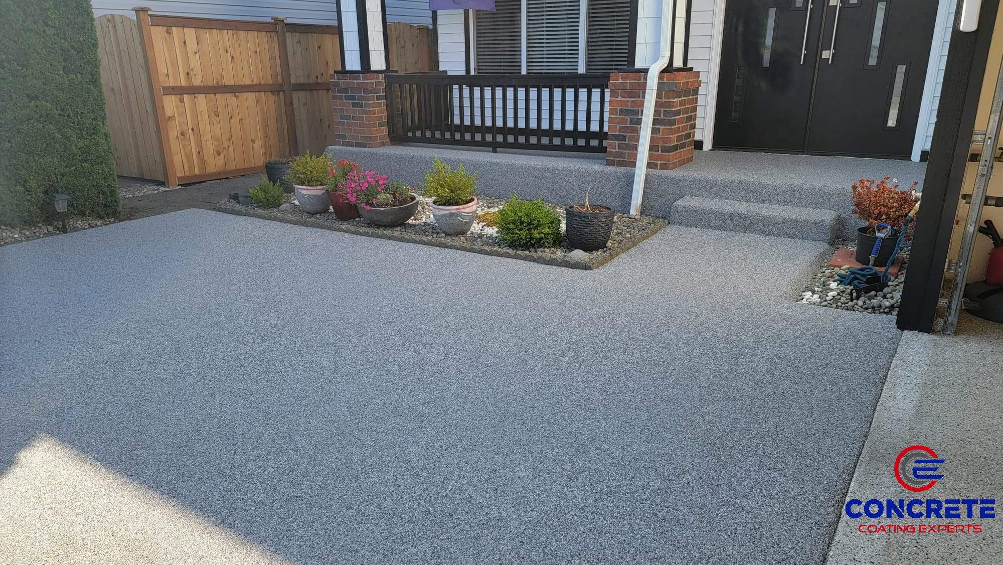 Poseidon Patio and Driveway by Concrete Coating Experts Inc.