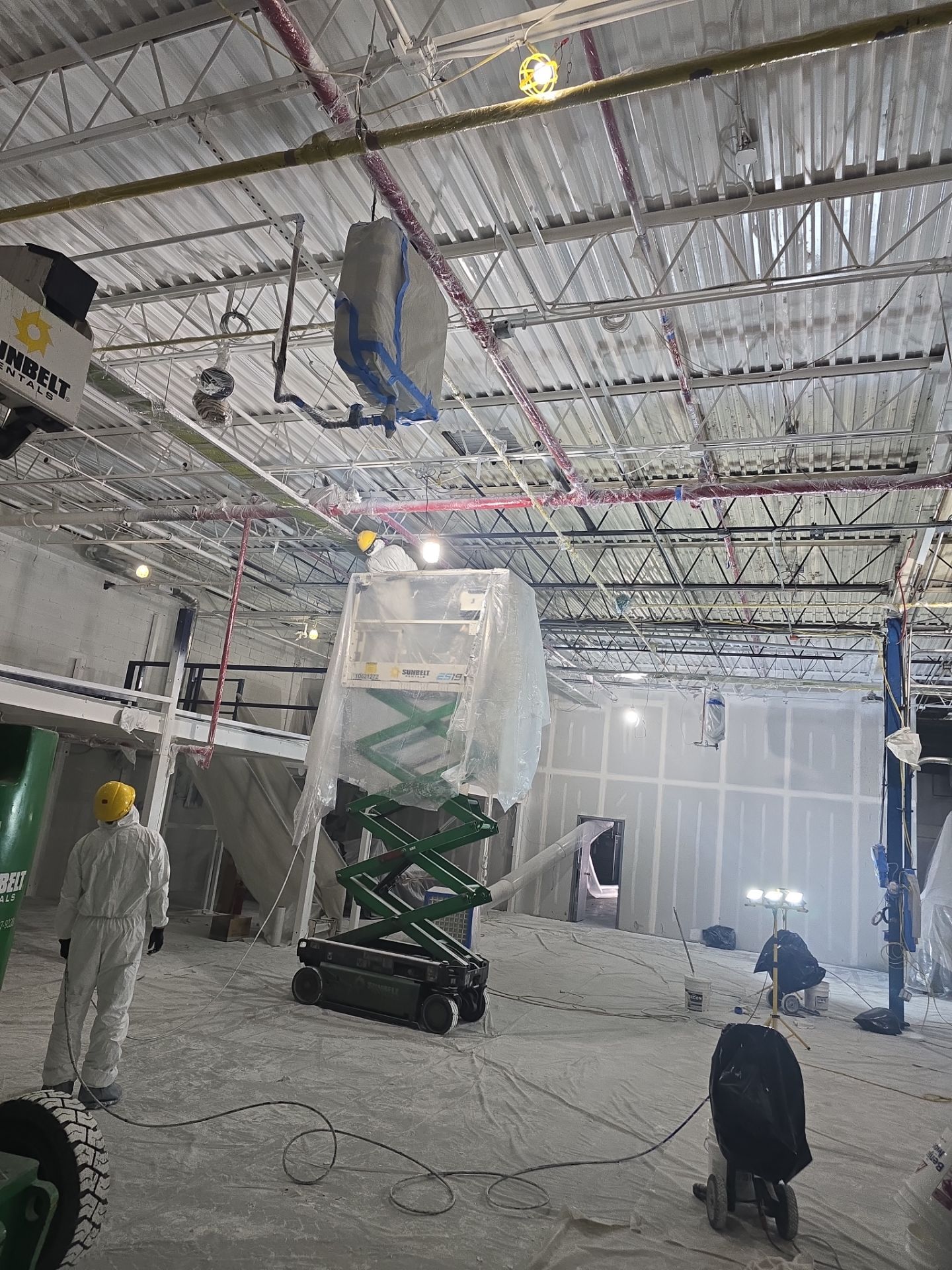 Industrial Warehouse Fire Damage Cleaning and Spray Sealing in Islandia by EMS Restoration Corp