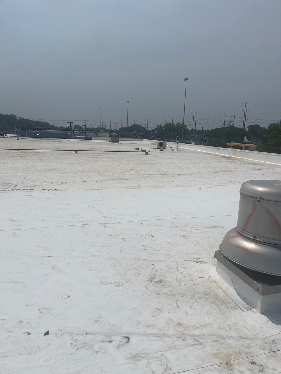 Ford Dealership - Re-Roof by Pink Roofing