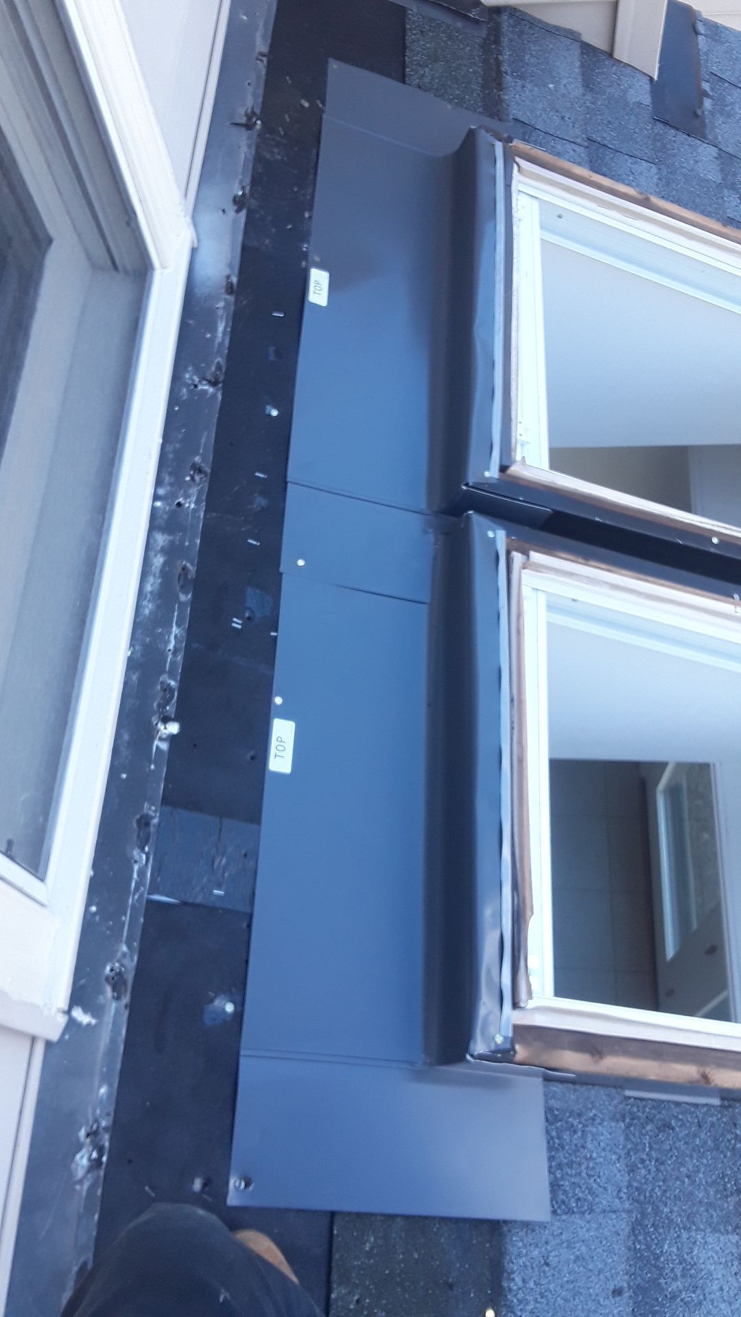 Roof, Window, and Skylight Replacement by American Home Contractors