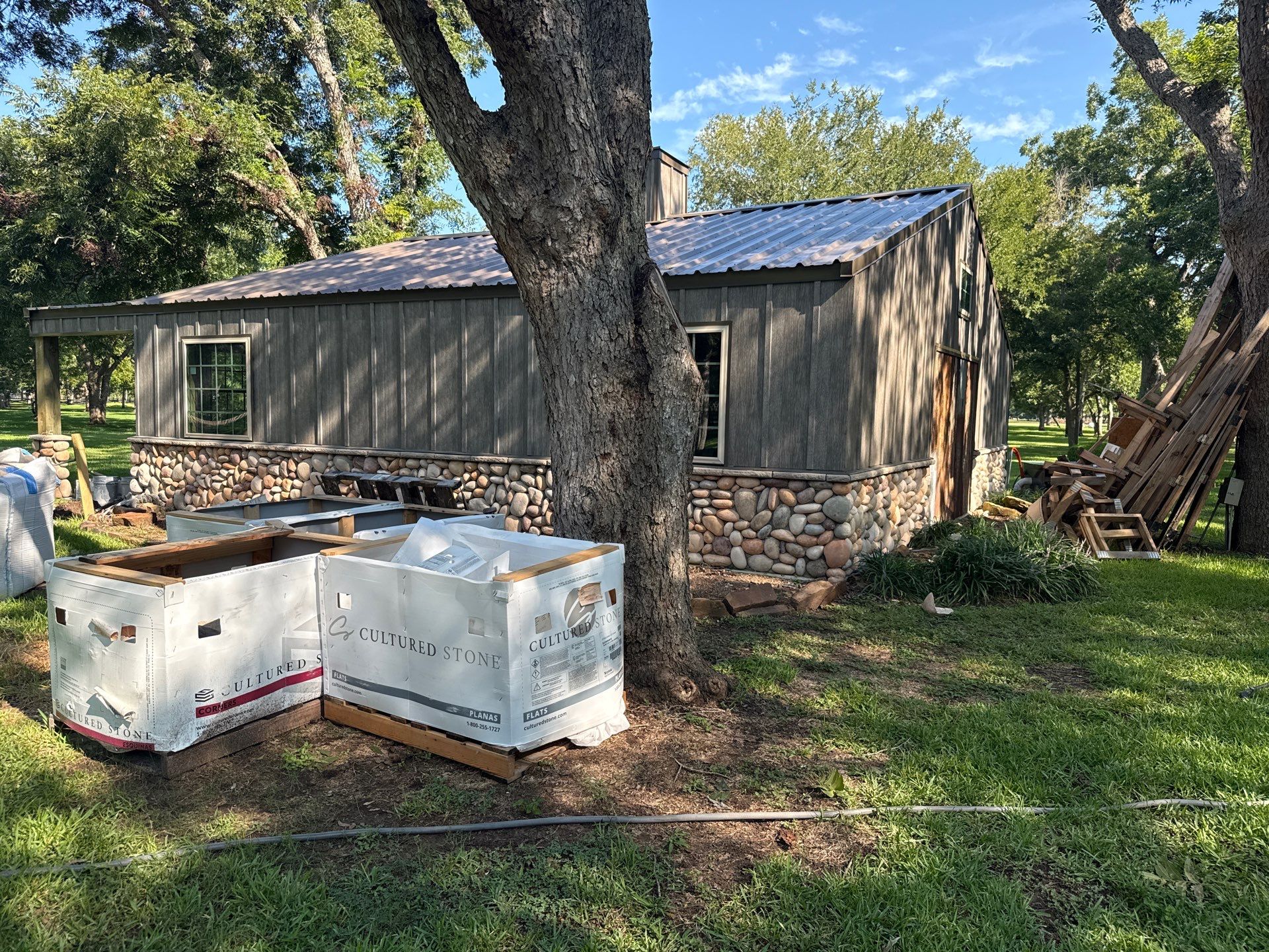 Richmond Addition: River Stone Detailing on a Hacienda Property by Apex Conventional Stucco Llc