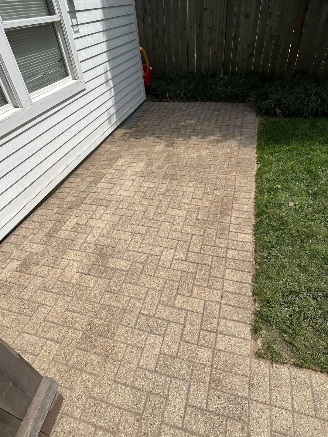 Brick patio repair, clean sand and seal by Northern Power Washing LLC.