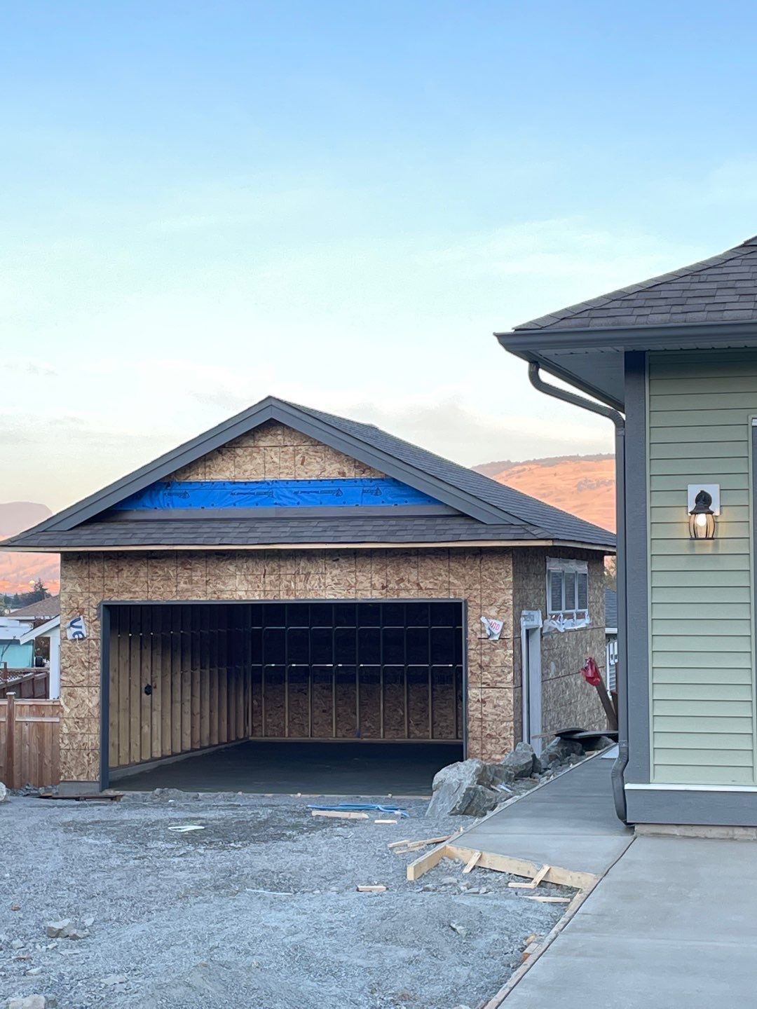 Residential Roofing Installation using IKO Weatherwood shingle by Top Notch Roofing Inc