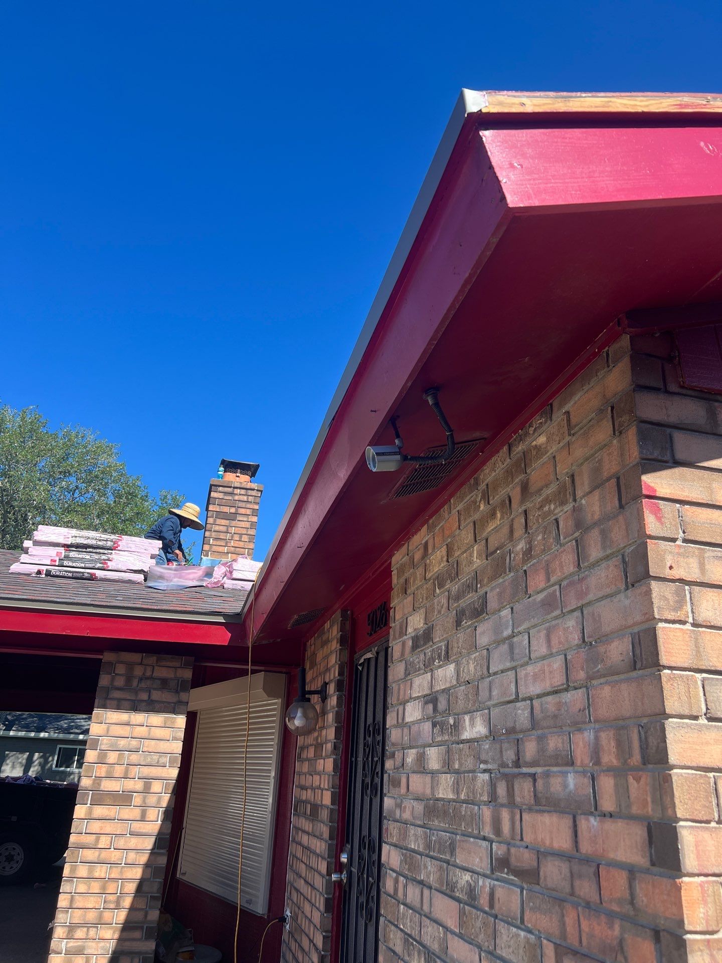 She looks good in Red by Bayfront Roofing and Construction