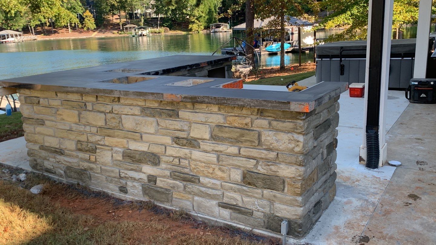 Outdoor Kitchen on Lake Keowee by Xtreme Concrete Services
