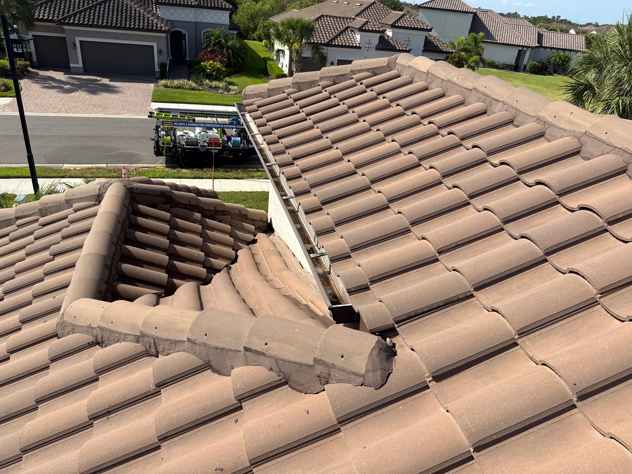 Soft Wash Roof Cleaning – Concrete Tile Roof | Artisan Lakes Esplanade, Palmetto, FL by Sunshine AquaWash