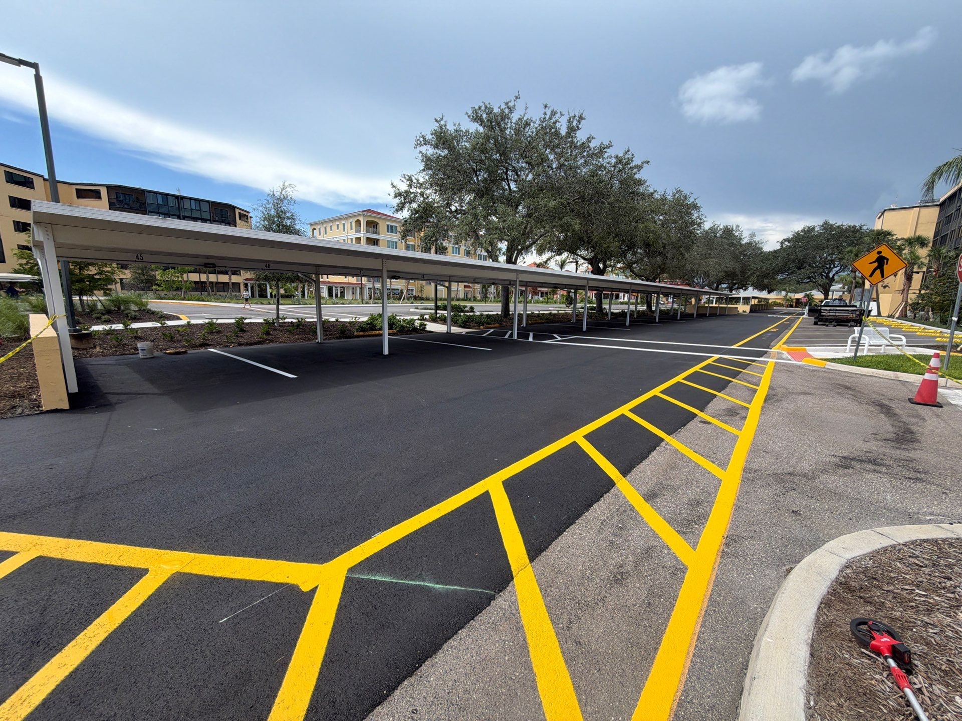 Comprehensive Parking Lot Mill and Overlay with Custom Line Striping in Venice by Everline Coatings & Services - Southwest FL