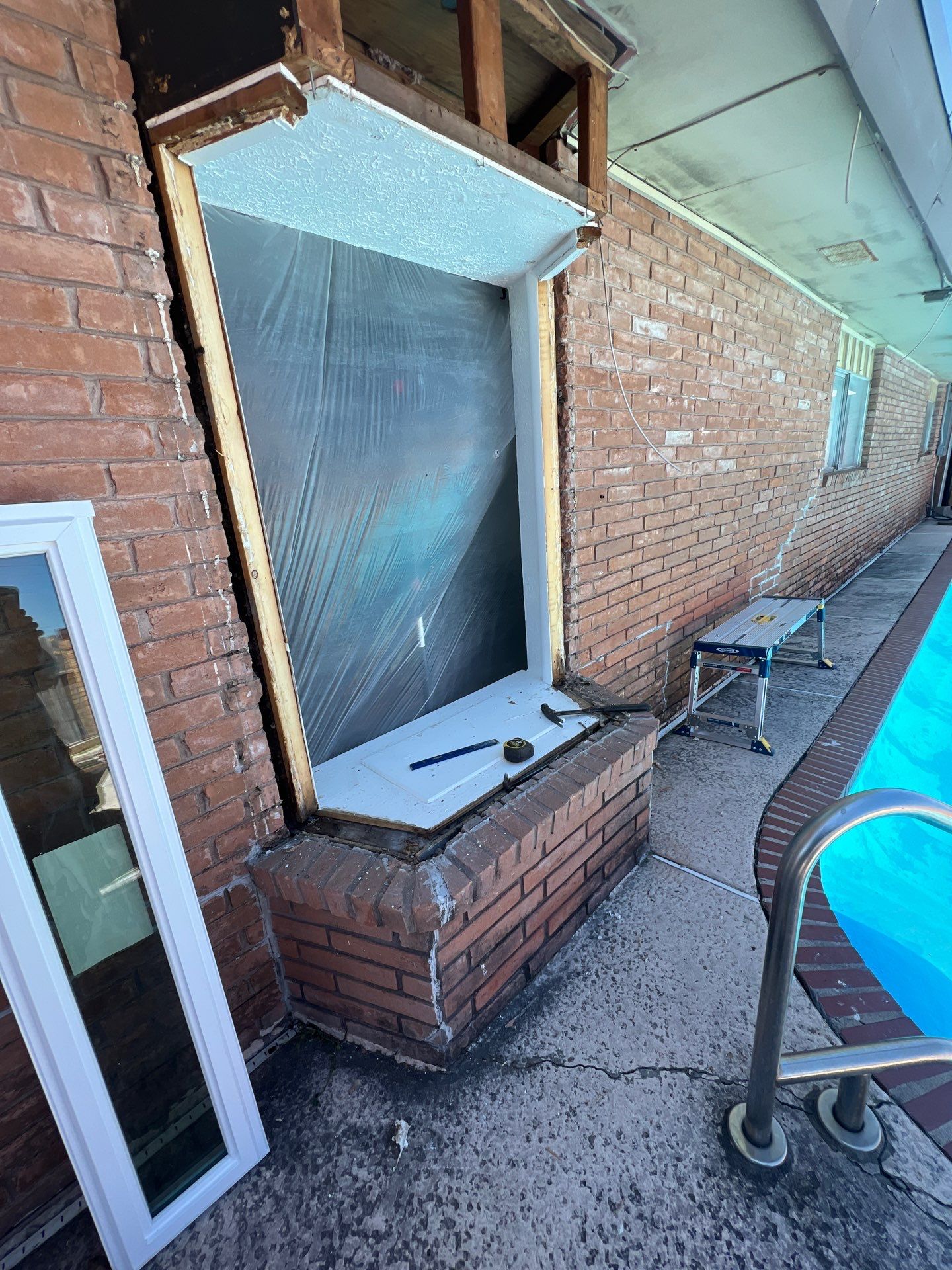 Windows in Brick with a Bay Window by Bayfront Roofing and Construction