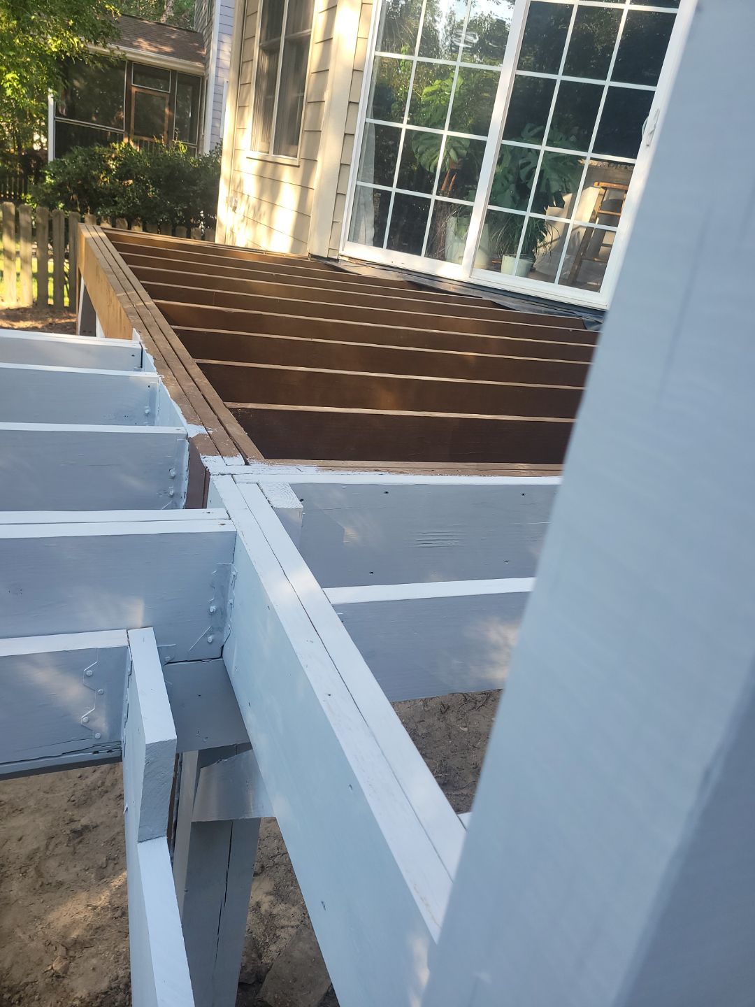 Fuquay-Varina Outdoor Upgrade – Composite Deck & Paved Landing by Elite Remodeling and Design LLC