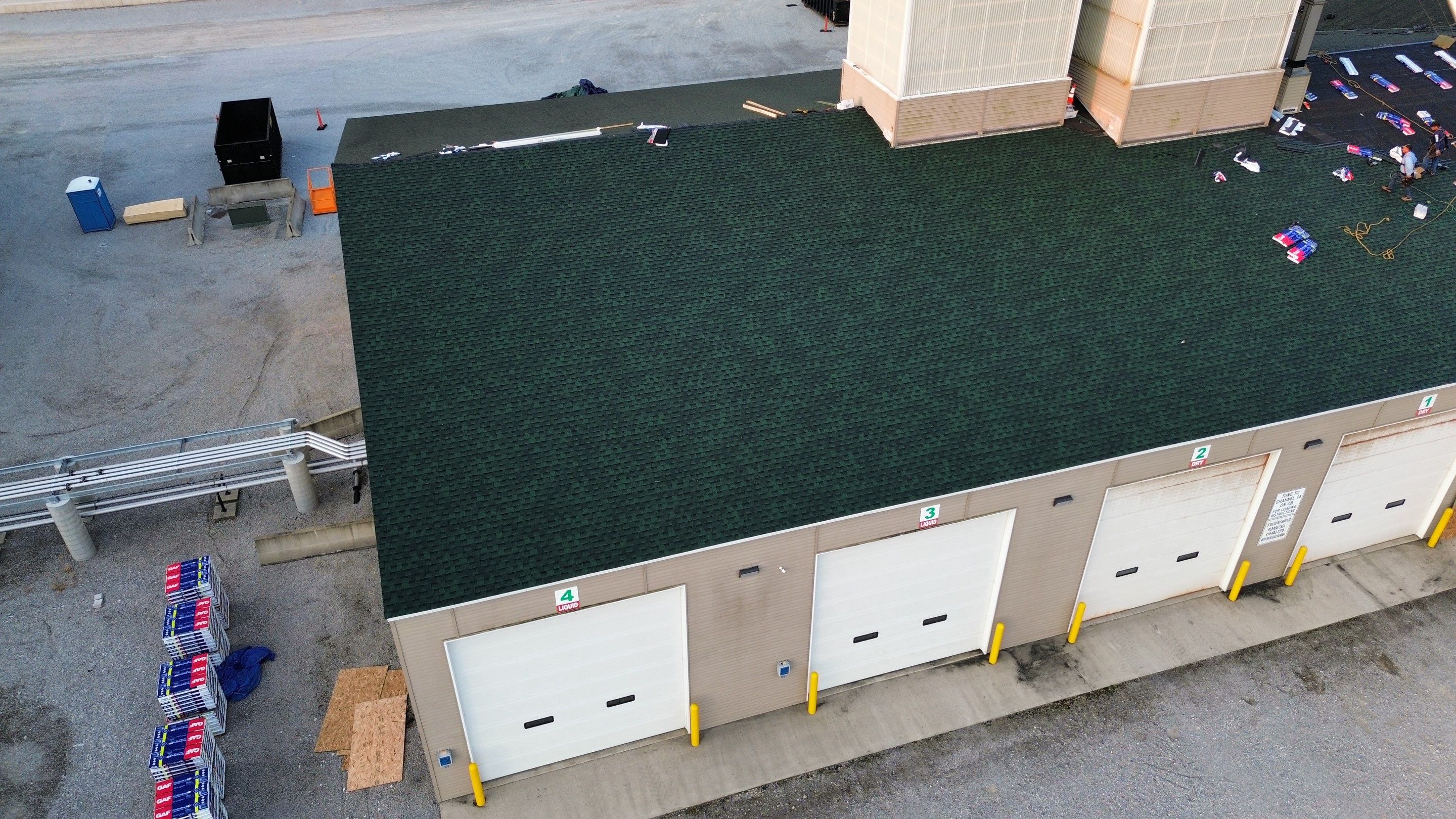 Commercial Roofing Installation using Timberline HDZ Shingles - Hunter Green by RoofX 