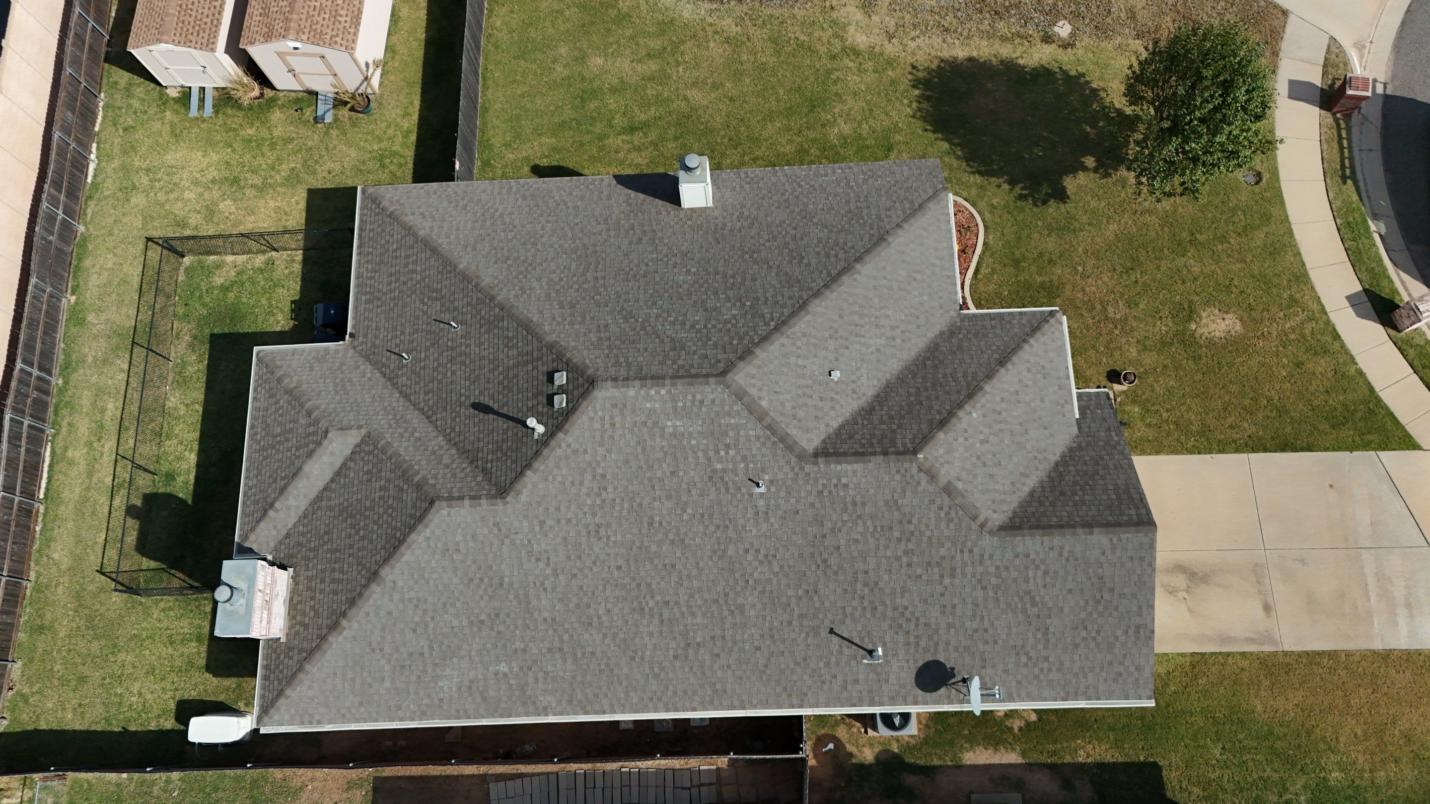 Residential Roofing Installation using titan xt rustic black by Thunder City Roofing