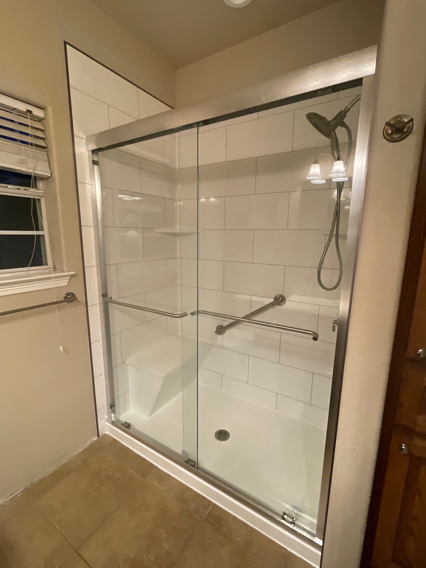 New low-threshold walk-in shower in Giddings by Lane Lauritsen - The Hill Country, Texas