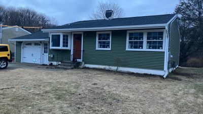 Beautiful Siding Transformation with Cert. Monogram D/4 Clapboard, Olive Grove
